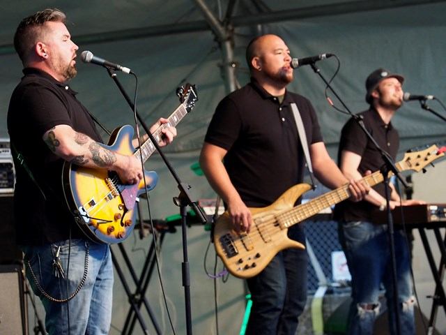 Live band playing on stage.