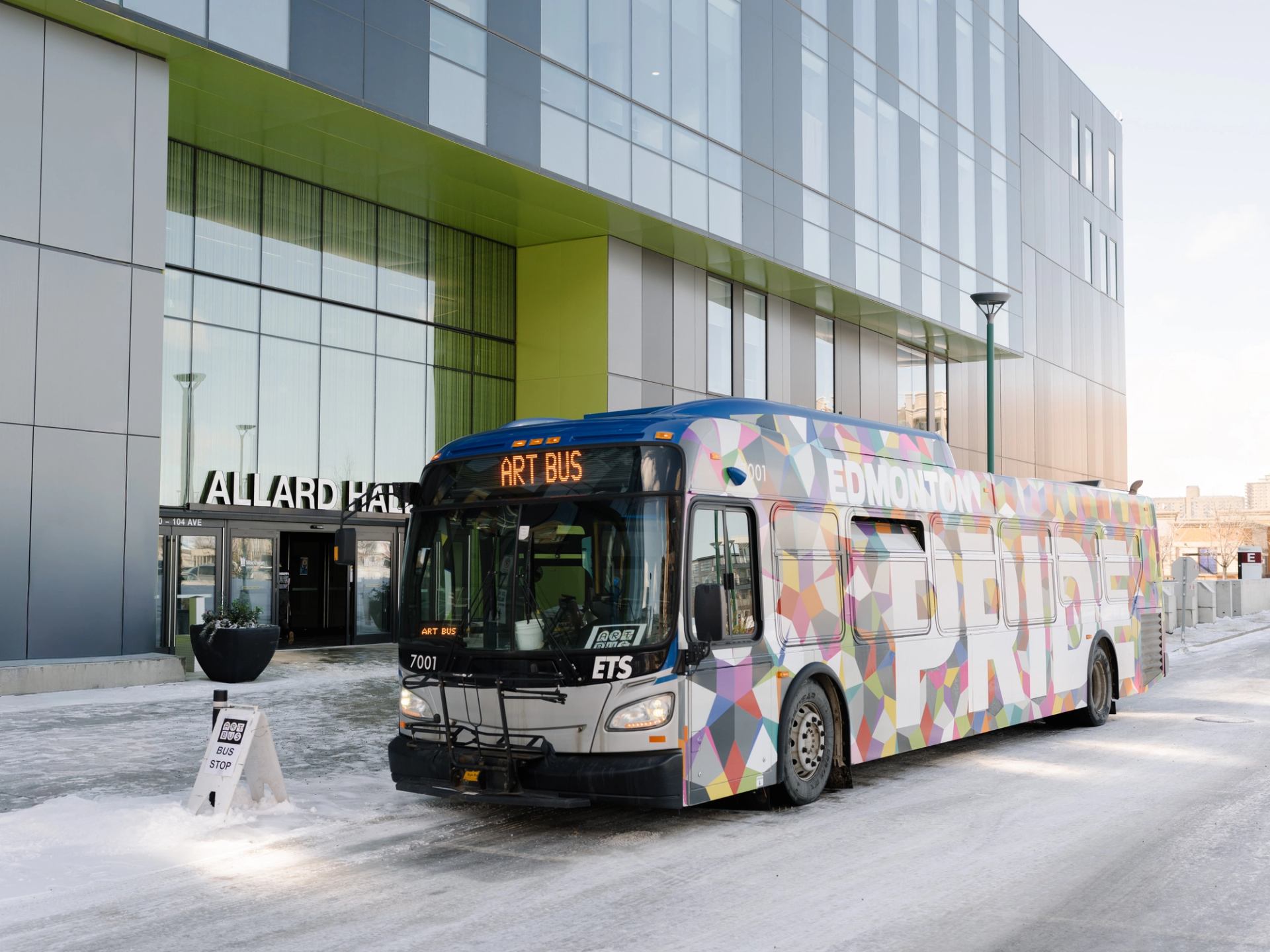A photo of the ArtBus parked outside Allard Hall. 