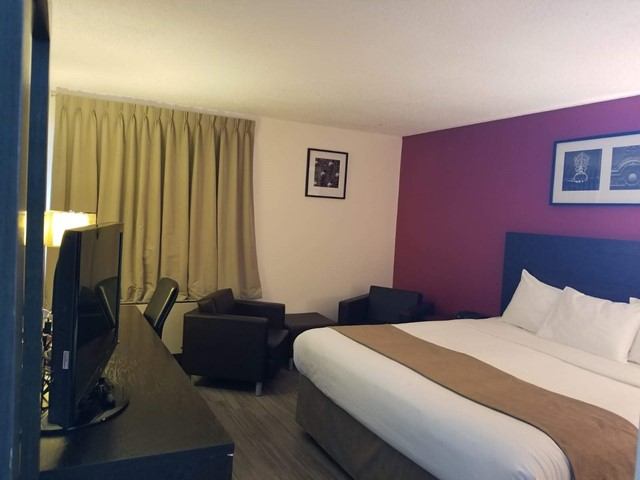 Travelodge by Wyndham exterior with modern facade and welcoming entrance.