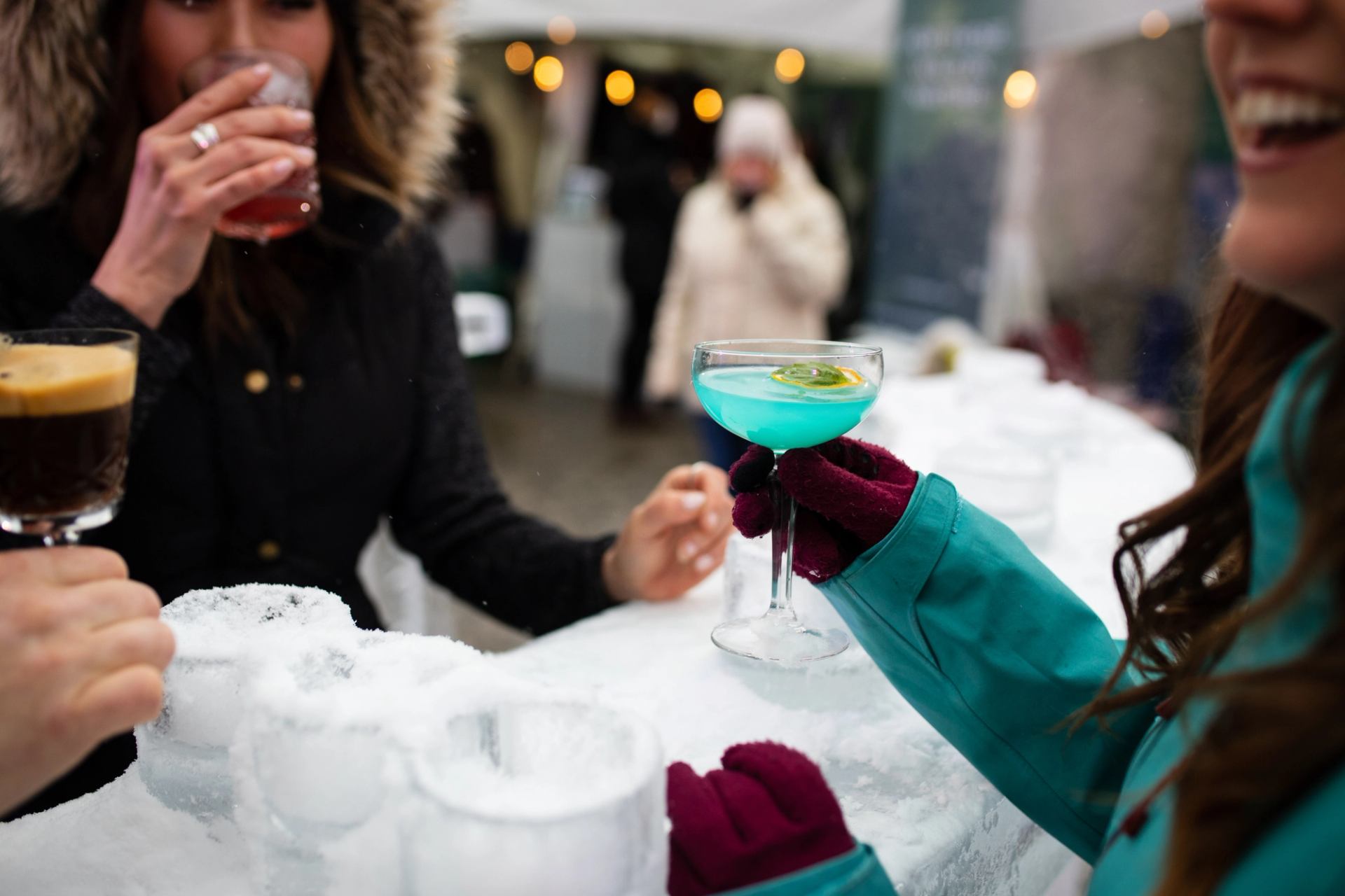 Guests enjoying cocktails at an outdoor ice bar during Tribute to Craft.