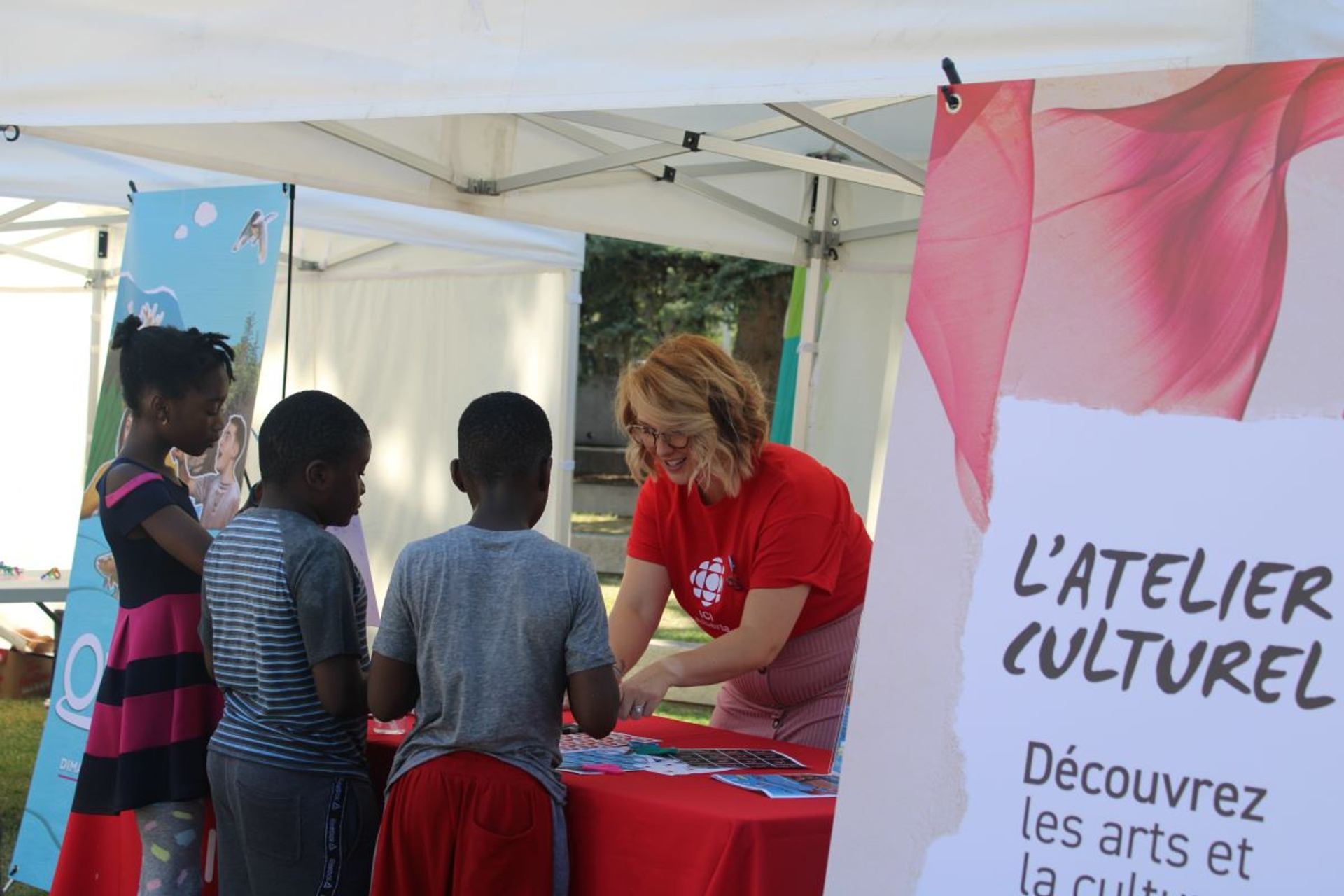 A group of children visiting one of the vendors.