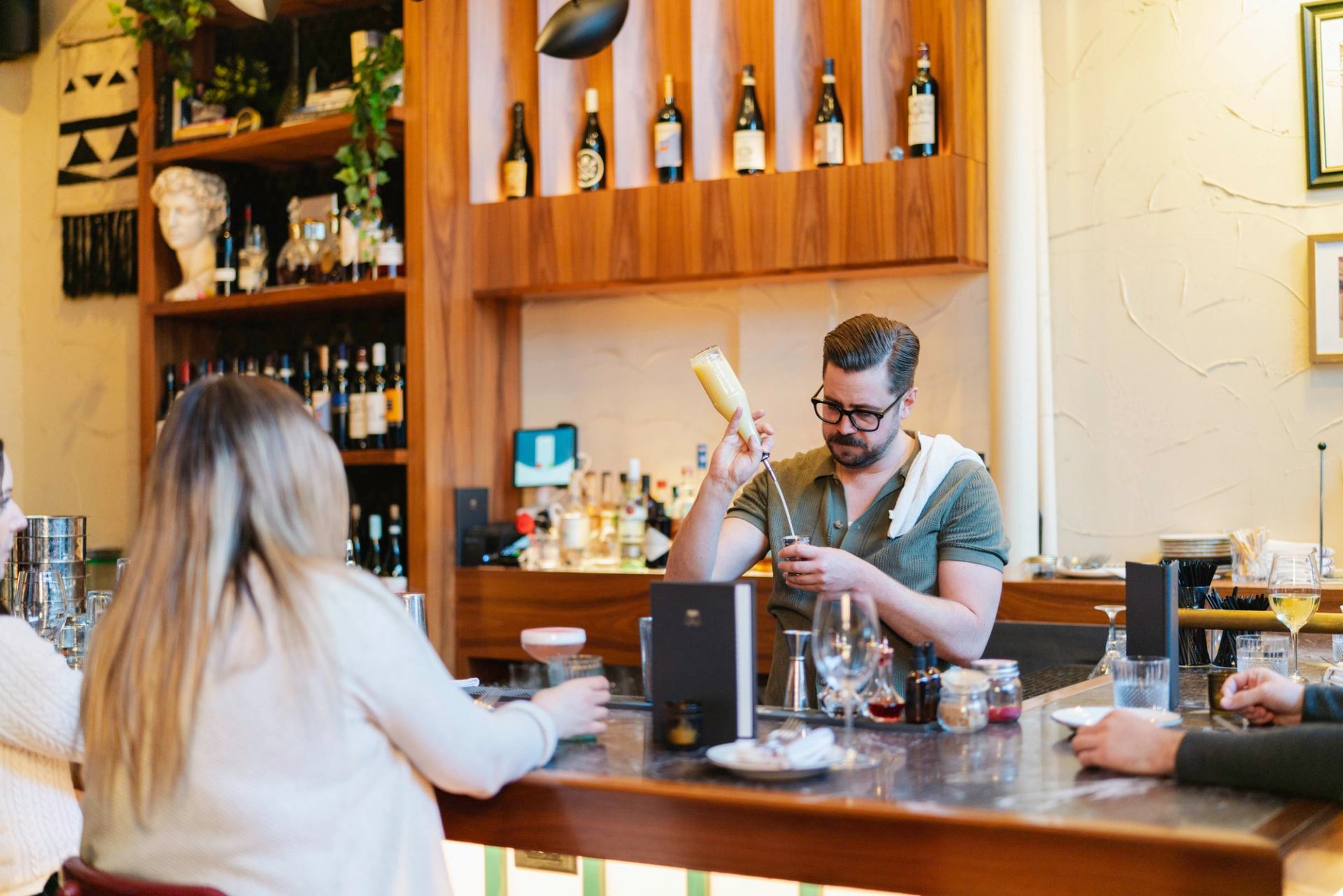 Making a drink at Pat & Betty.