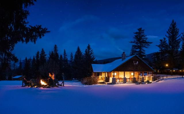 People around fire pit at Fairmont Jasper Park Lodge