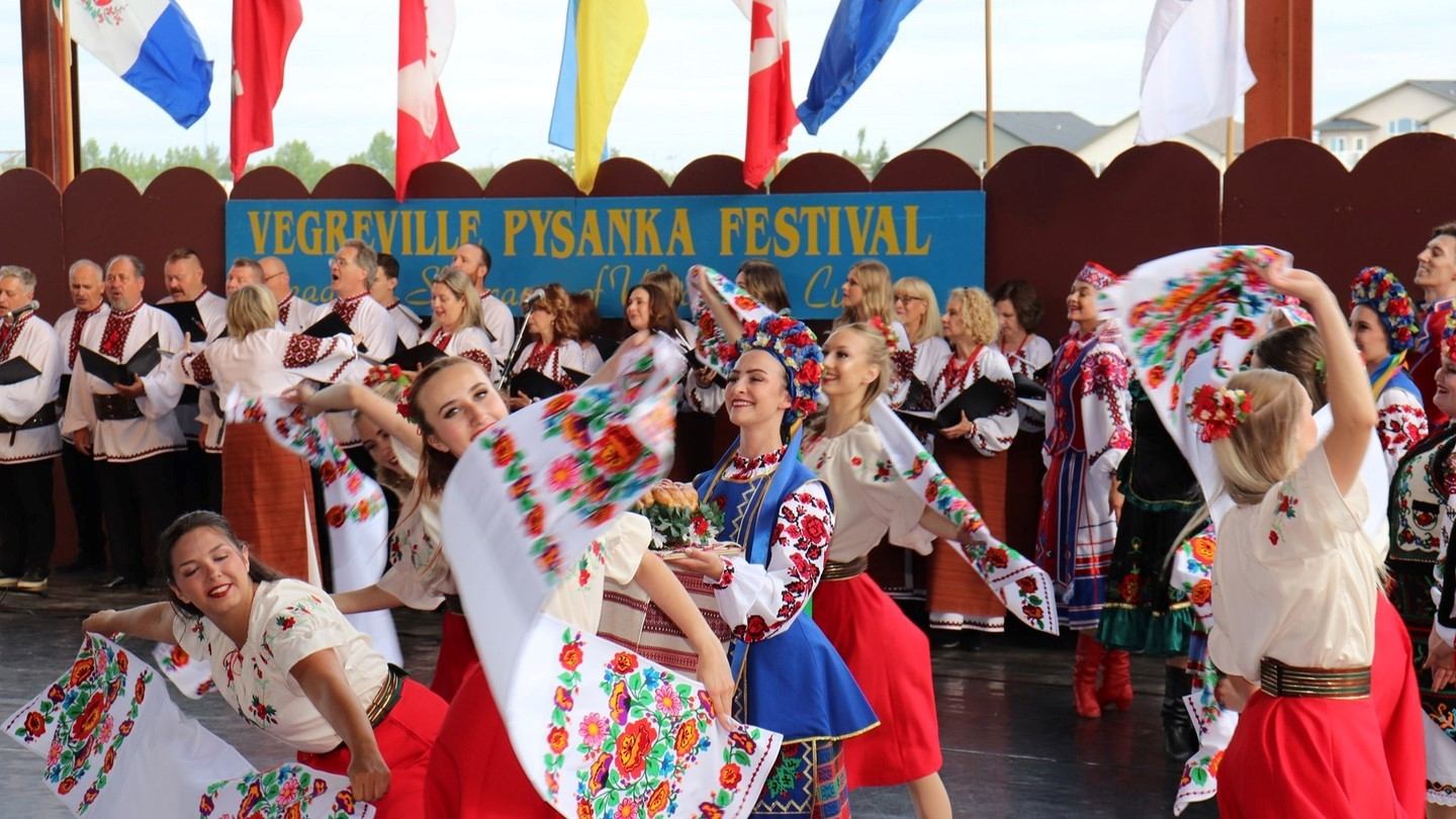 Ukrainian dancers in traditional dress performing at Pysanka Festival.