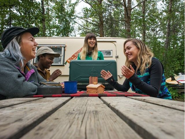 Friends camping at Jarvis Bay Provincial Campground with a trailer.