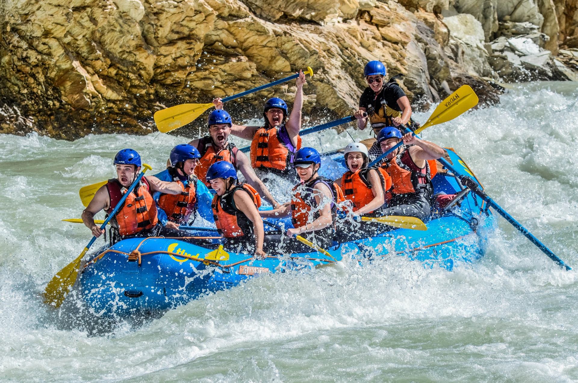 A group of people riding in a raft