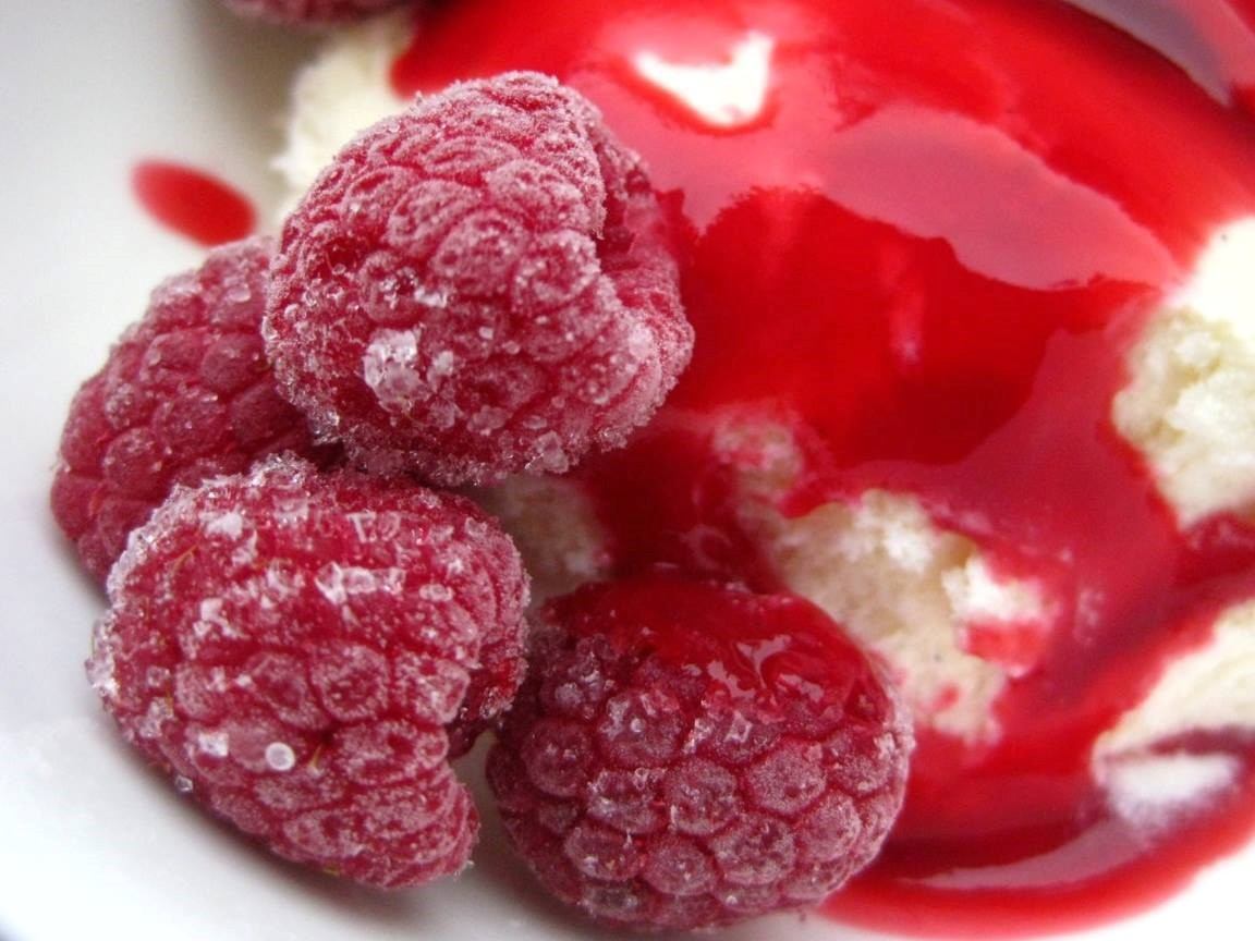 Frosted raspberries on vanilla cream with red syrup at Boyle Farmers' Market.