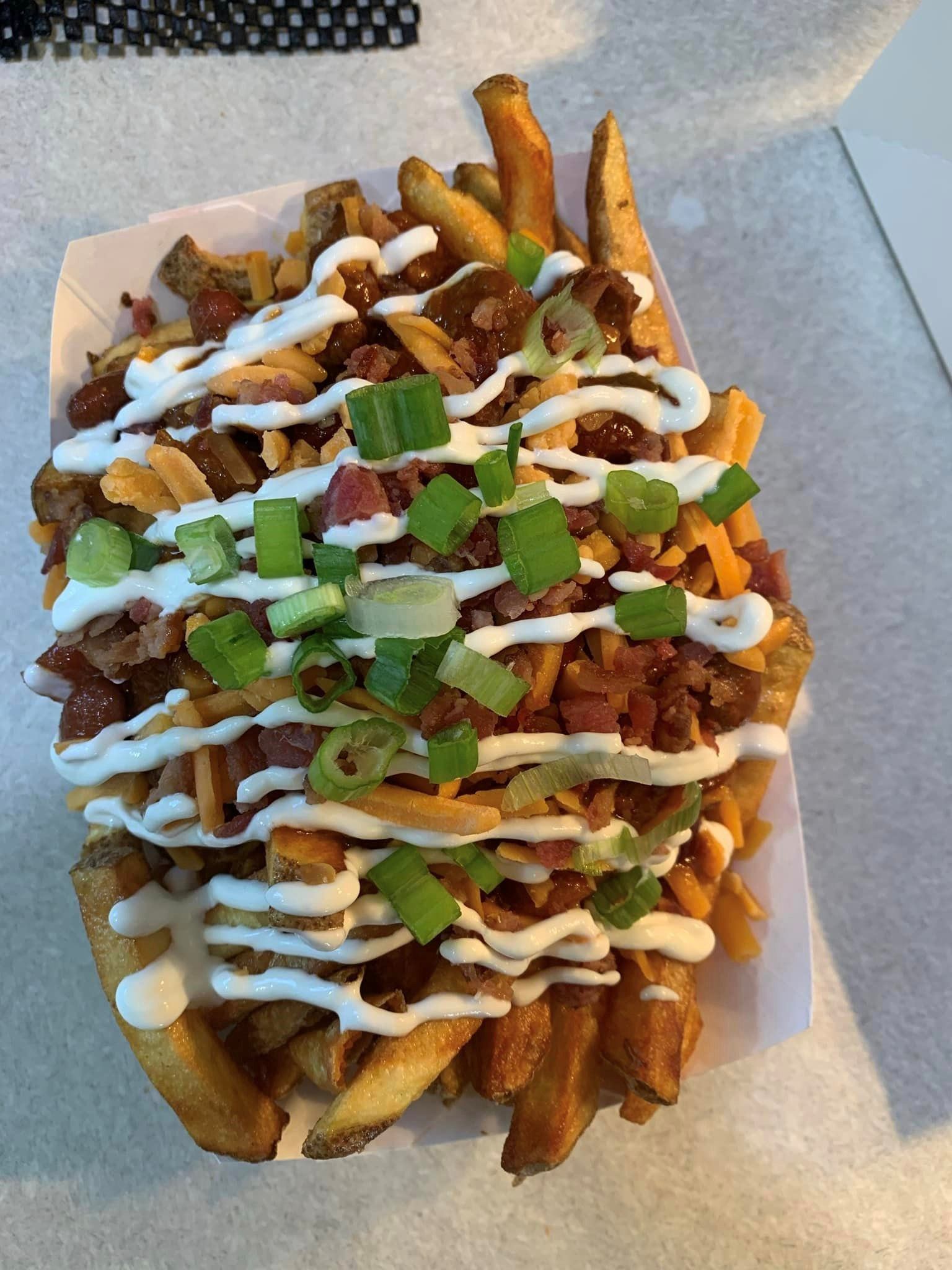 Fry Factory food truck with bold graphics and serving window.