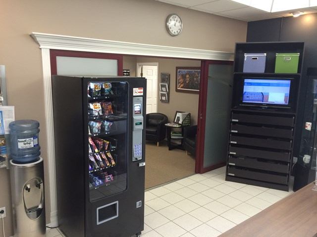 Interior of Leduc Chamber of Commerce with seating and vending machine