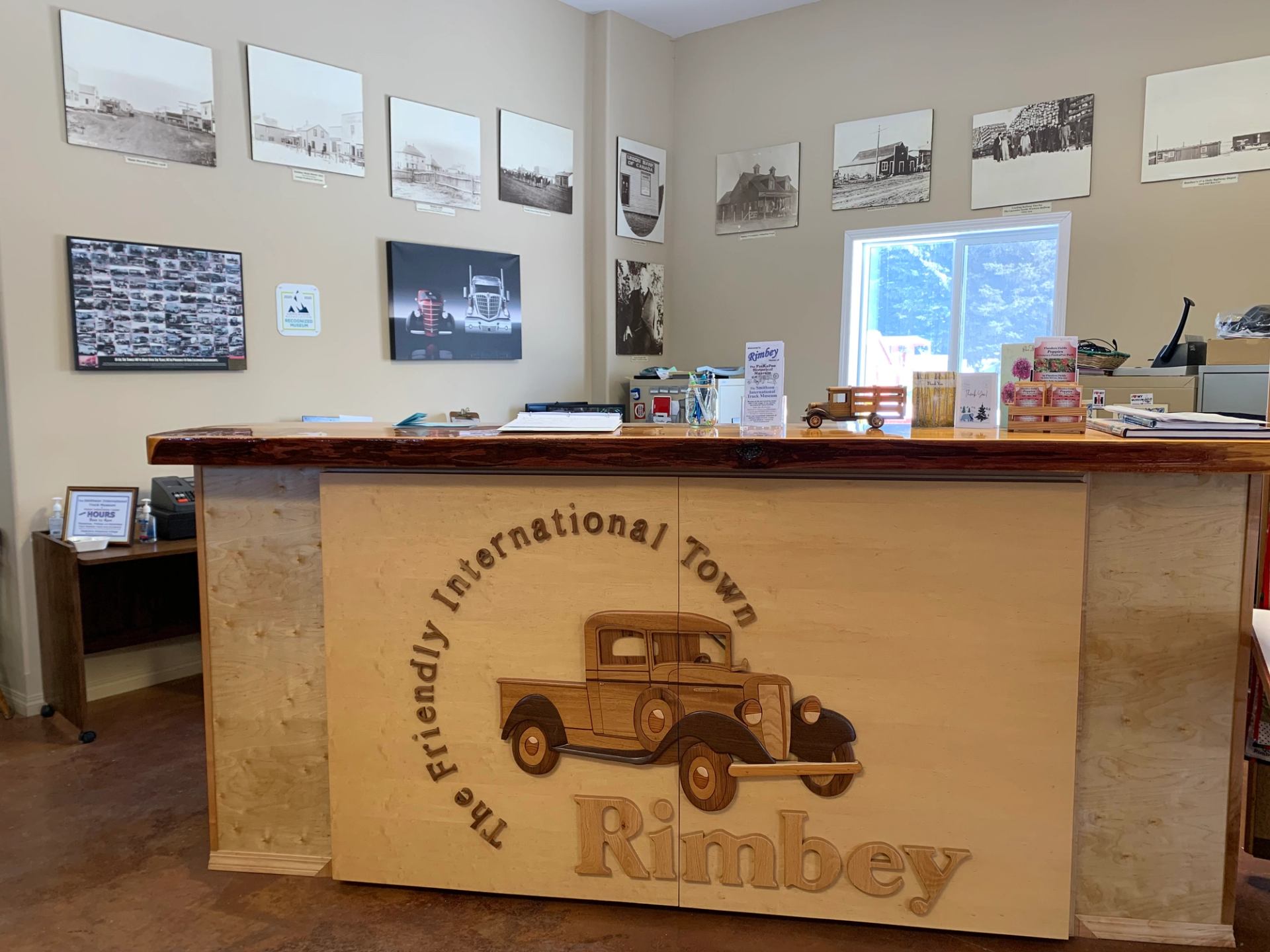 Info desk at Rimbey Visitor Centre with historic photos