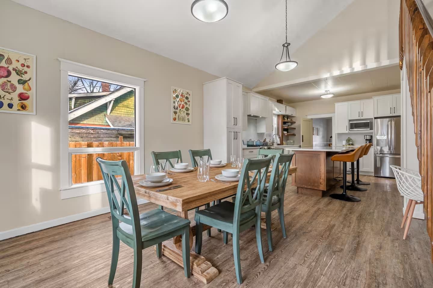 An expansive dining room leading into the kitchen