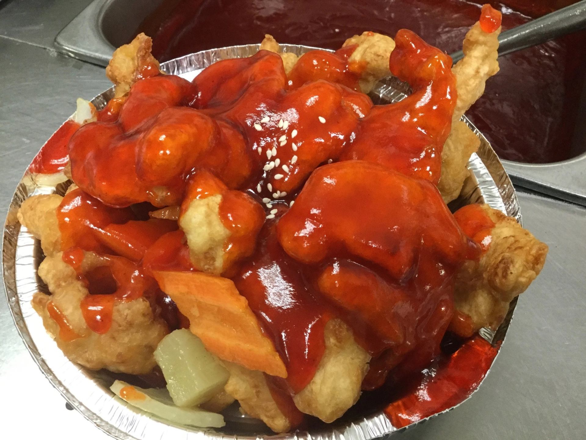 Sweet, spicy, and crispy—this dish brings the heat and the happiness.
