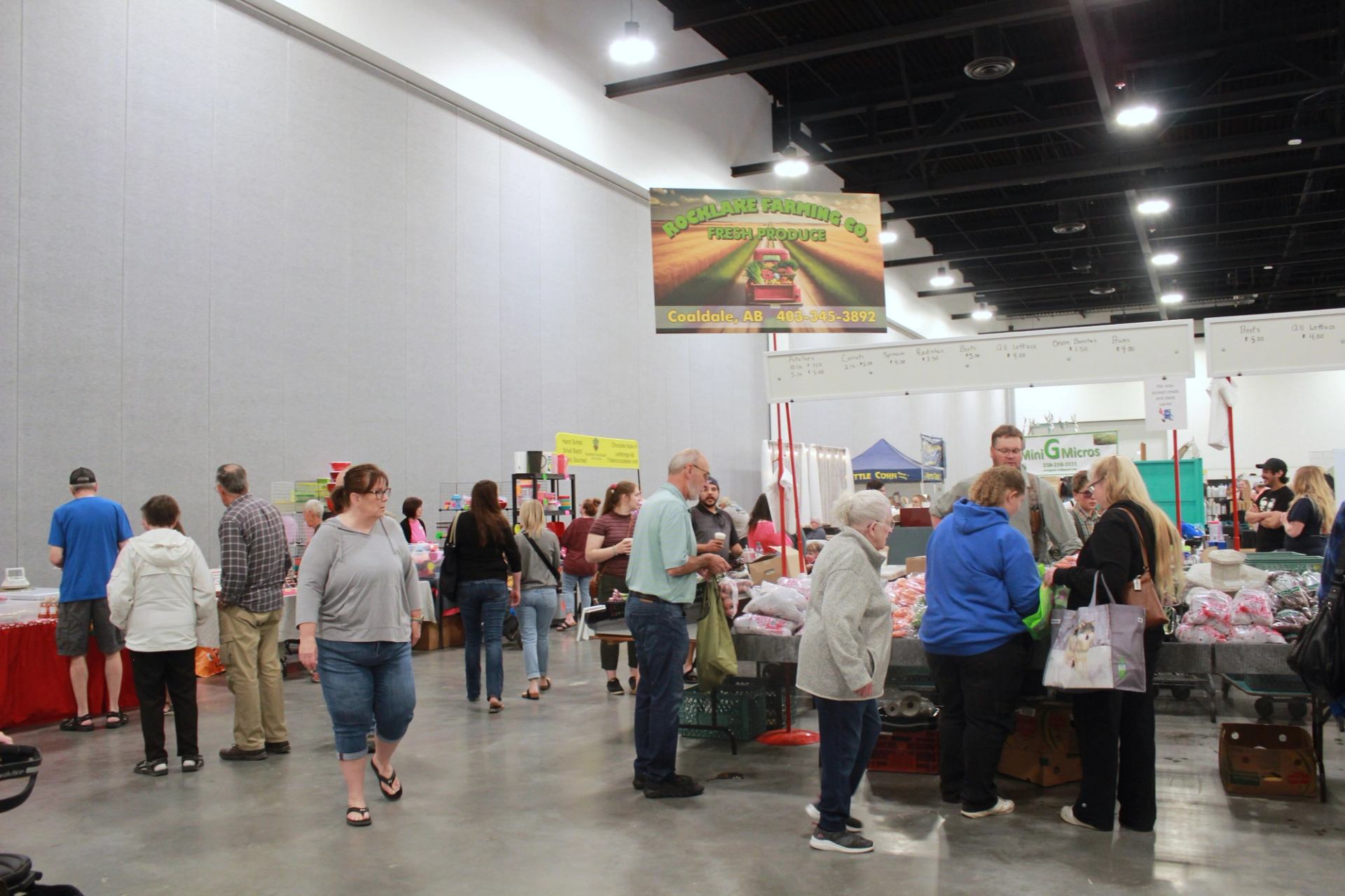 Inside market with people visiting the vendors