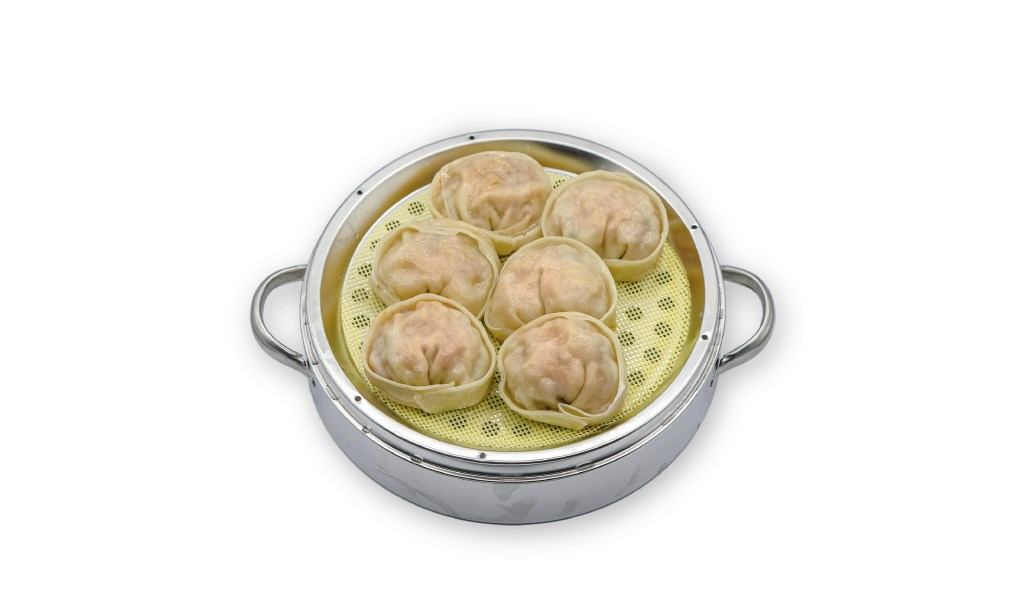 Steaming pot with six dumplings on a perforated basket, Hanbo menu text below.