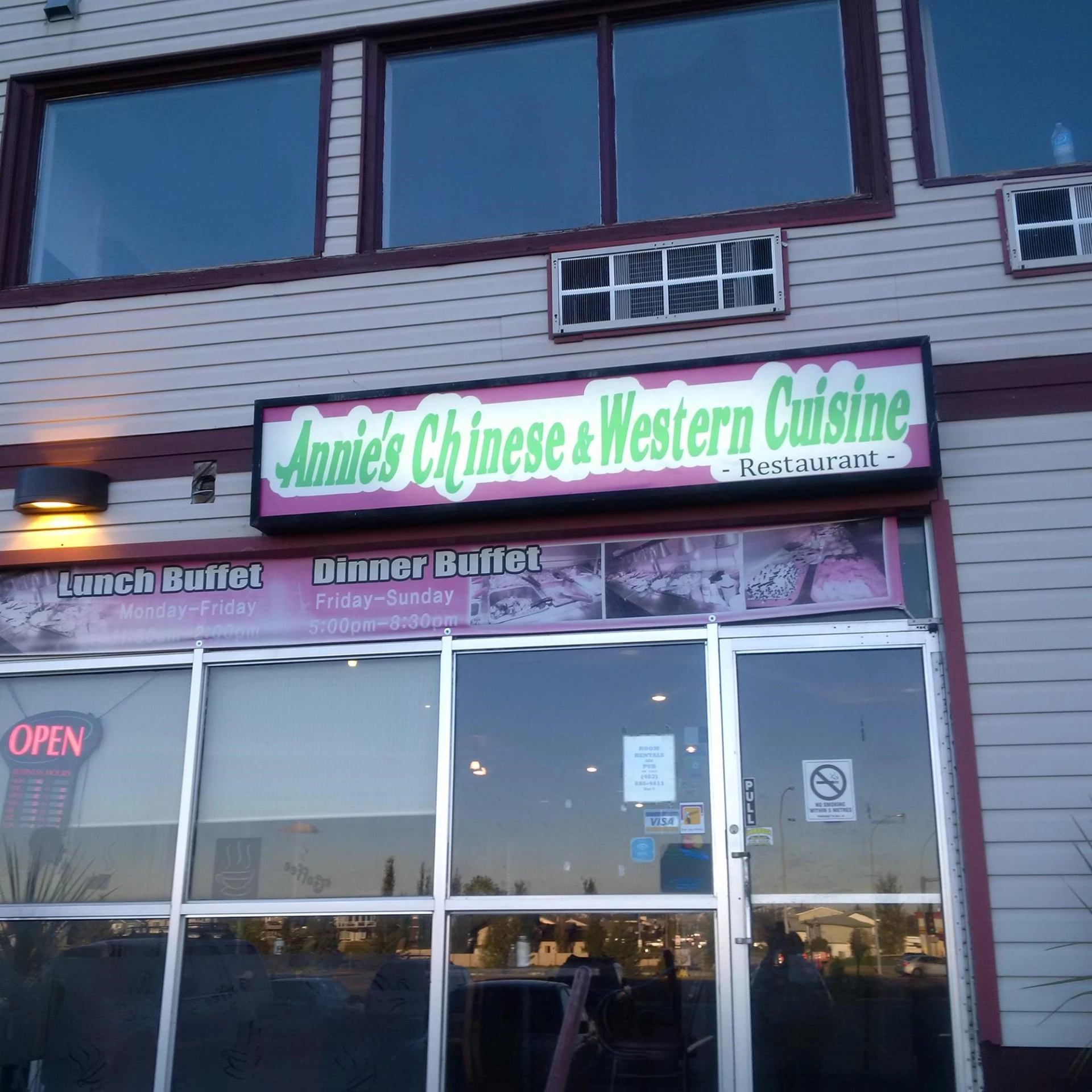 Annie’s Chinese & Western Cuisine Restaurant sign above glass entrance doors.