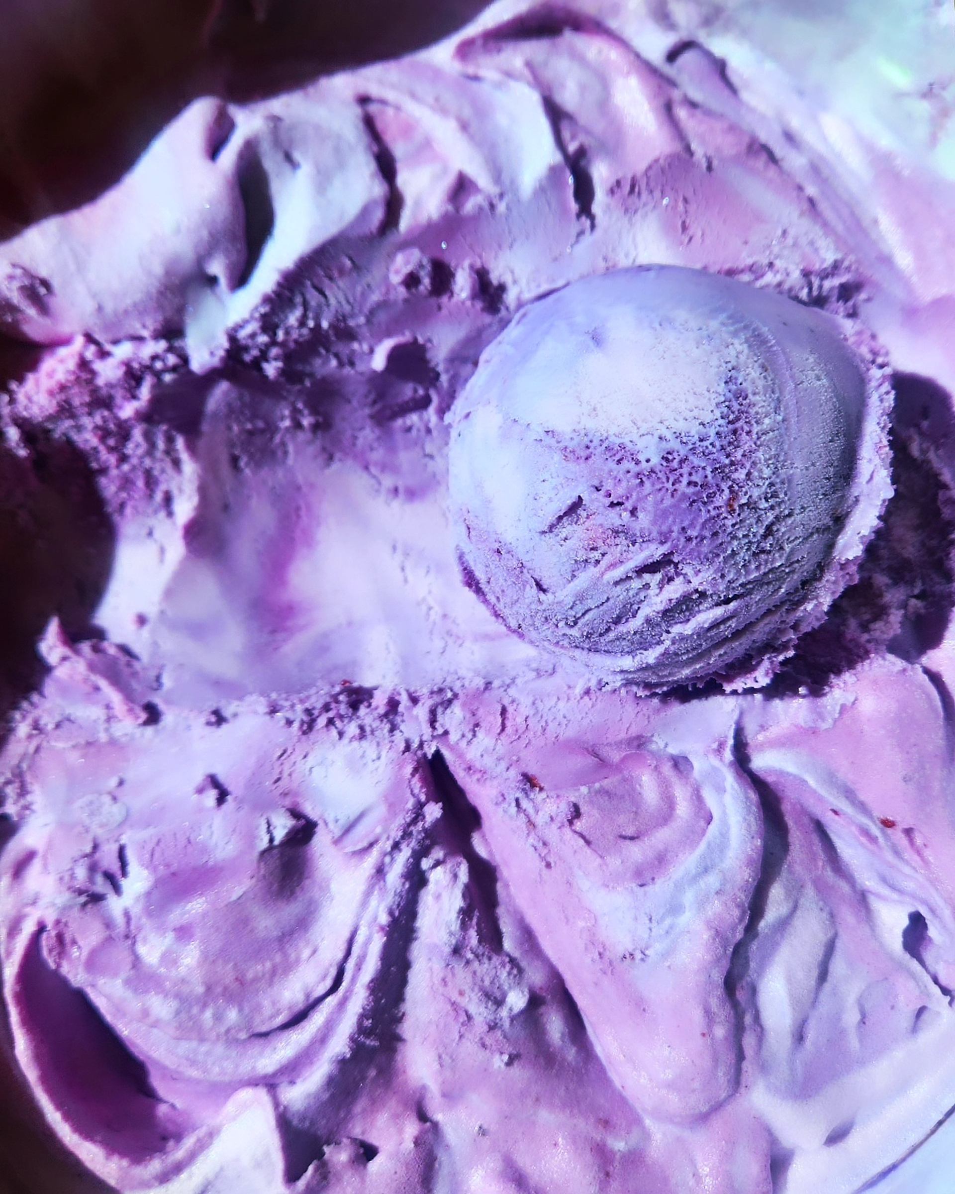 A mystical blackcurrant ice cream swirled with a magical bubblegum-esque ice cream.