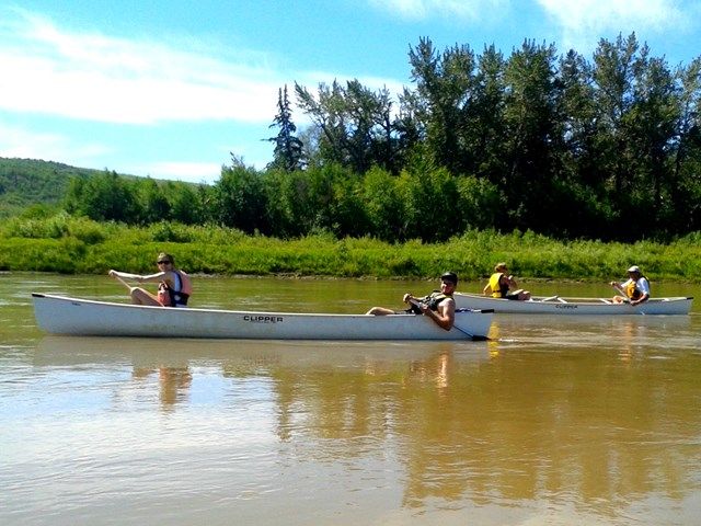 People canoeing in Peace River.