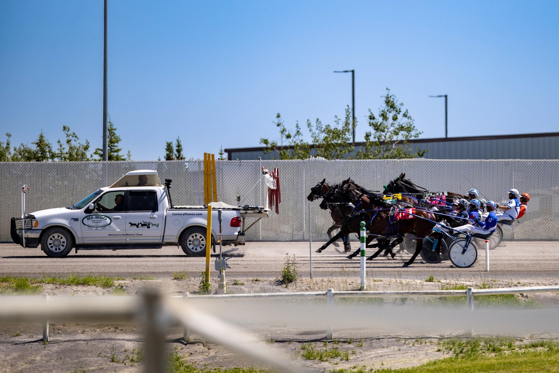 The horses line up behind the Starting Gate Truck 