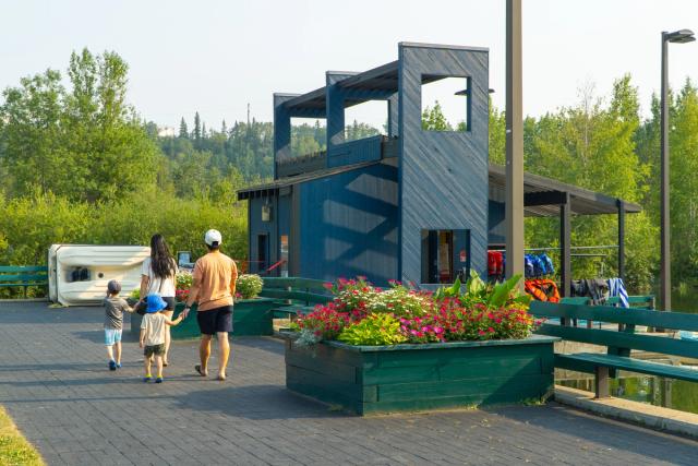 Family walking at Rundle Park Paddleboat and Hydrobike Rentals.