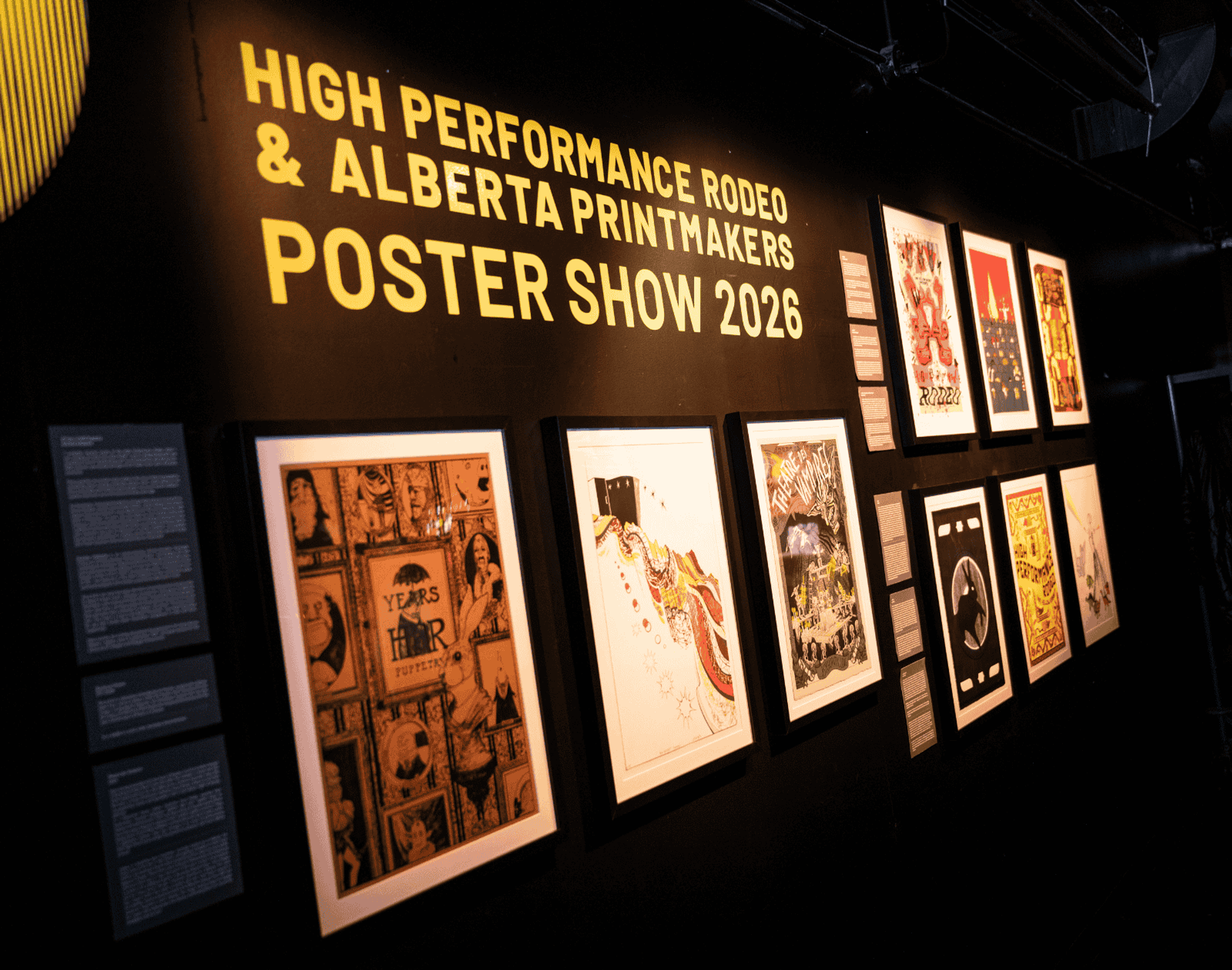 Framed posters on display in the Laycraft Lounge as part of the High Performance Rodeo.