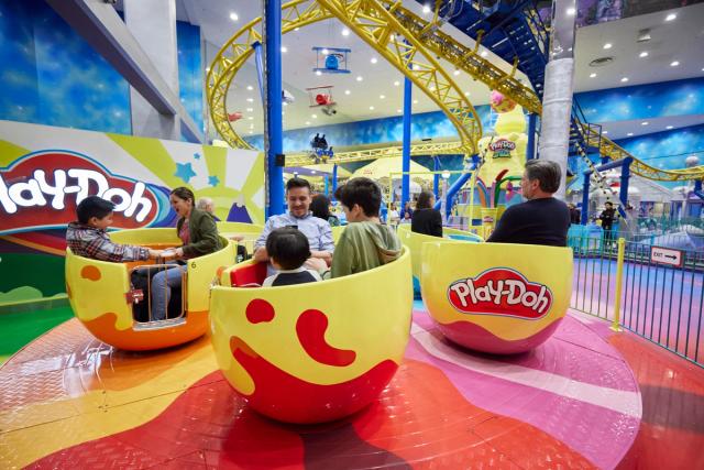 Family enjoying the rides at Galaxy Land at West Edmonton Mall.