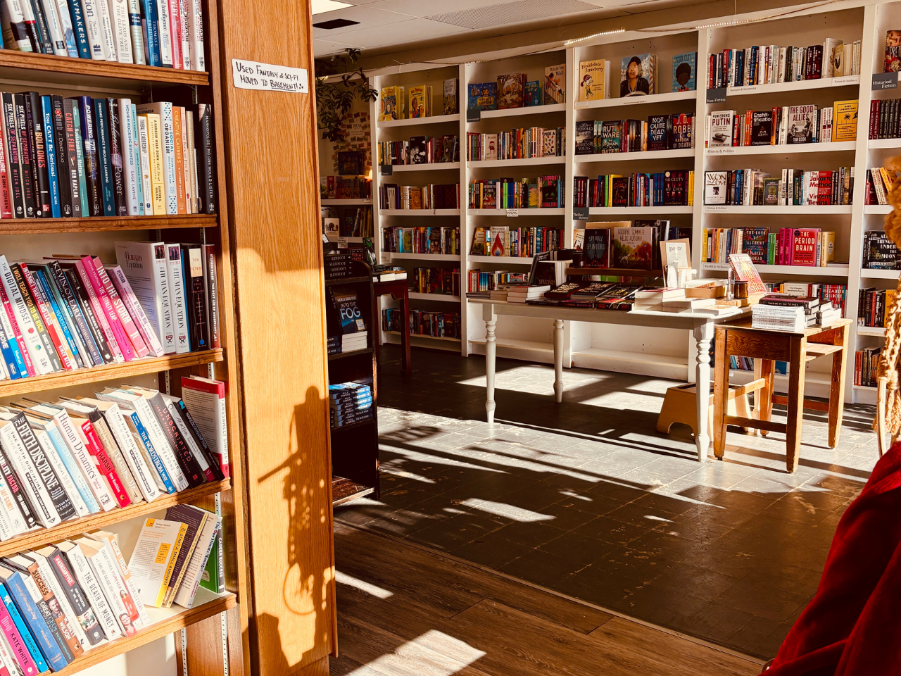 inside indie bookstore showing bookshelves filled with books