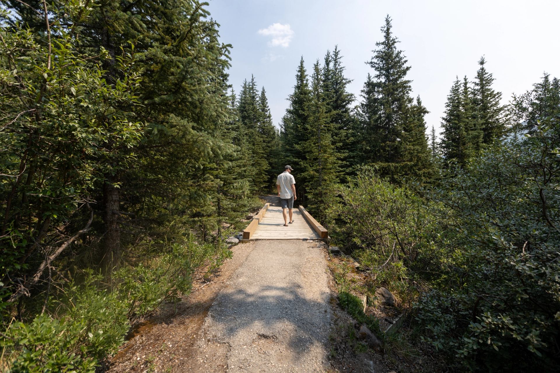 Man walking on trail at Columbia Icefields Campground.