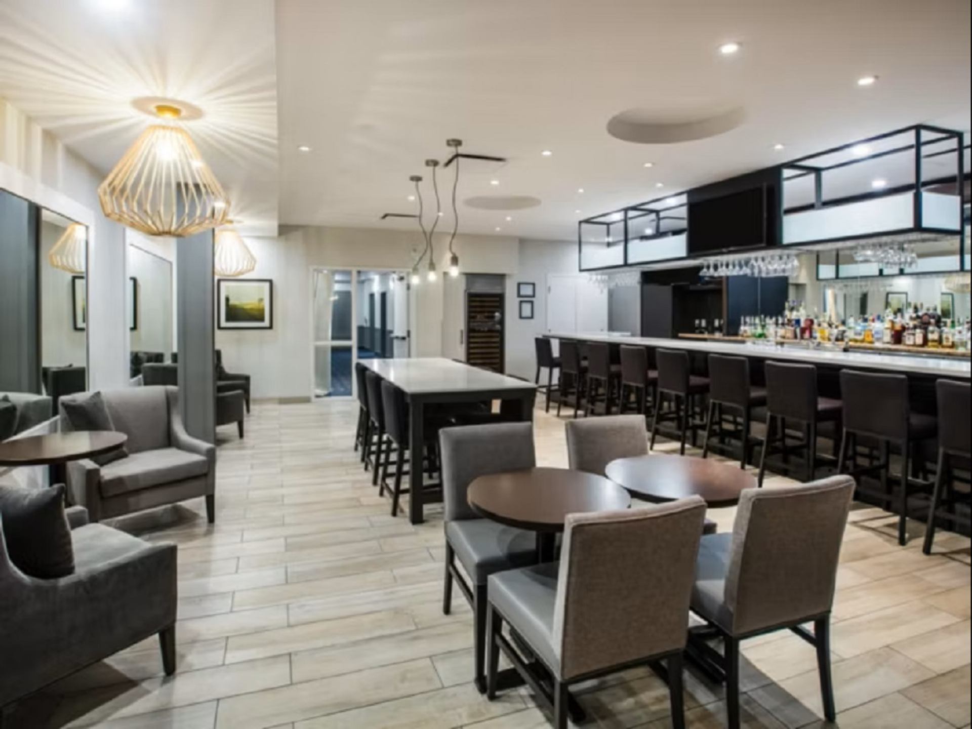 Stylish hotel lounge with modern seating and lighting.