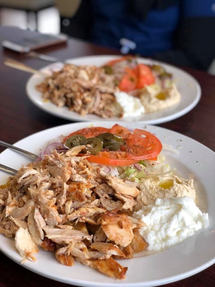 Two plates of delicous food.