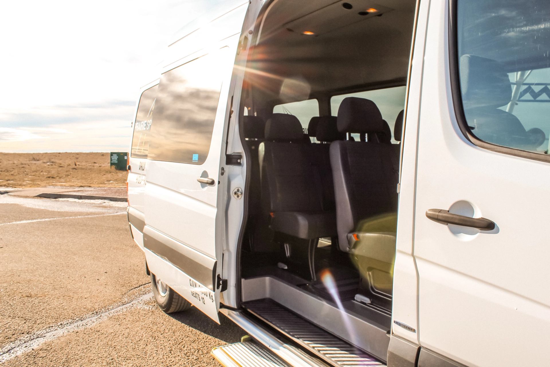 A close up of a Prairie Sprinter bus with the door open.