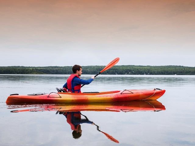 A person paddling a kayak