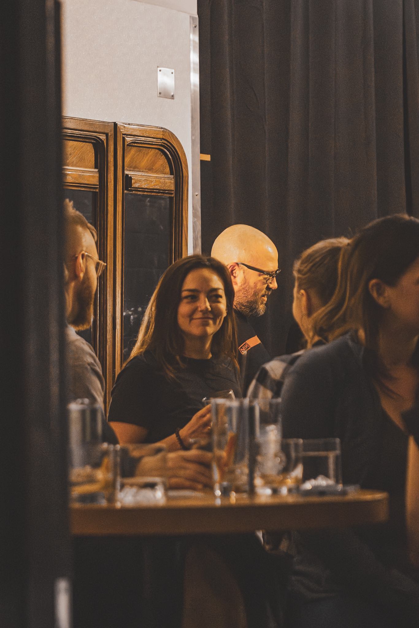 Local community enjoying WLD Hour Craft Cocktails during Open Mic Nights at Wild Life Distillery