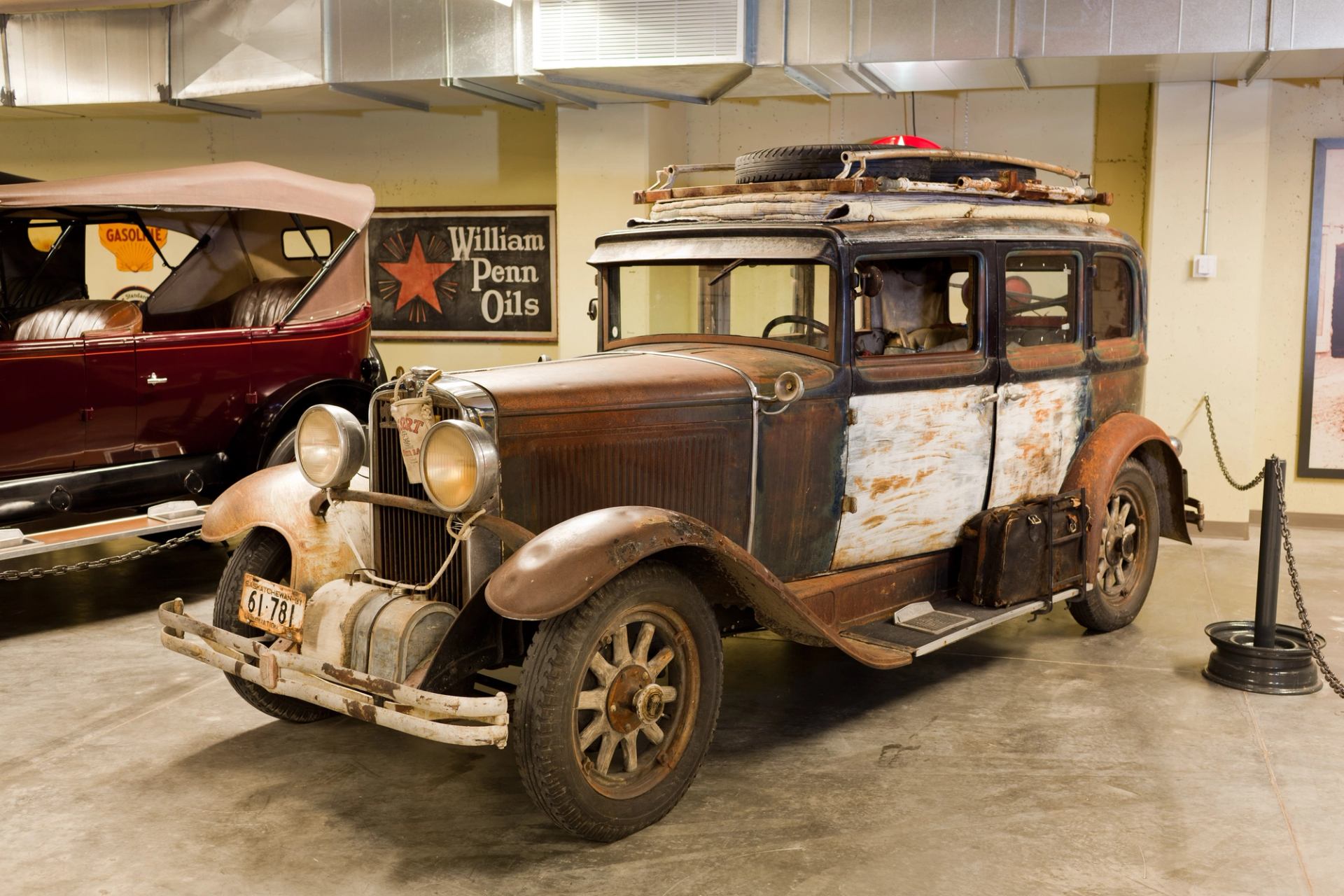 A close up of and old car on display at Gasoline Alley.