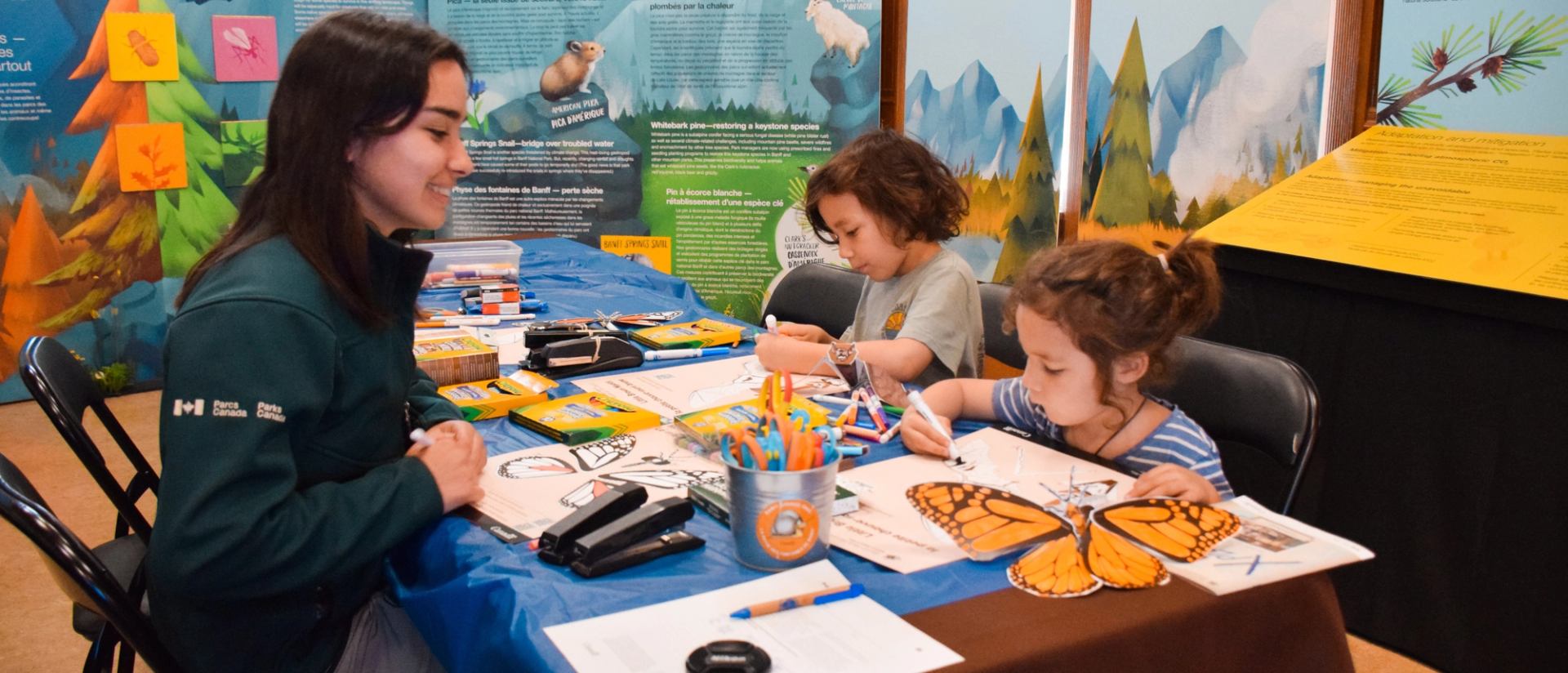 Some kids doing crafts.