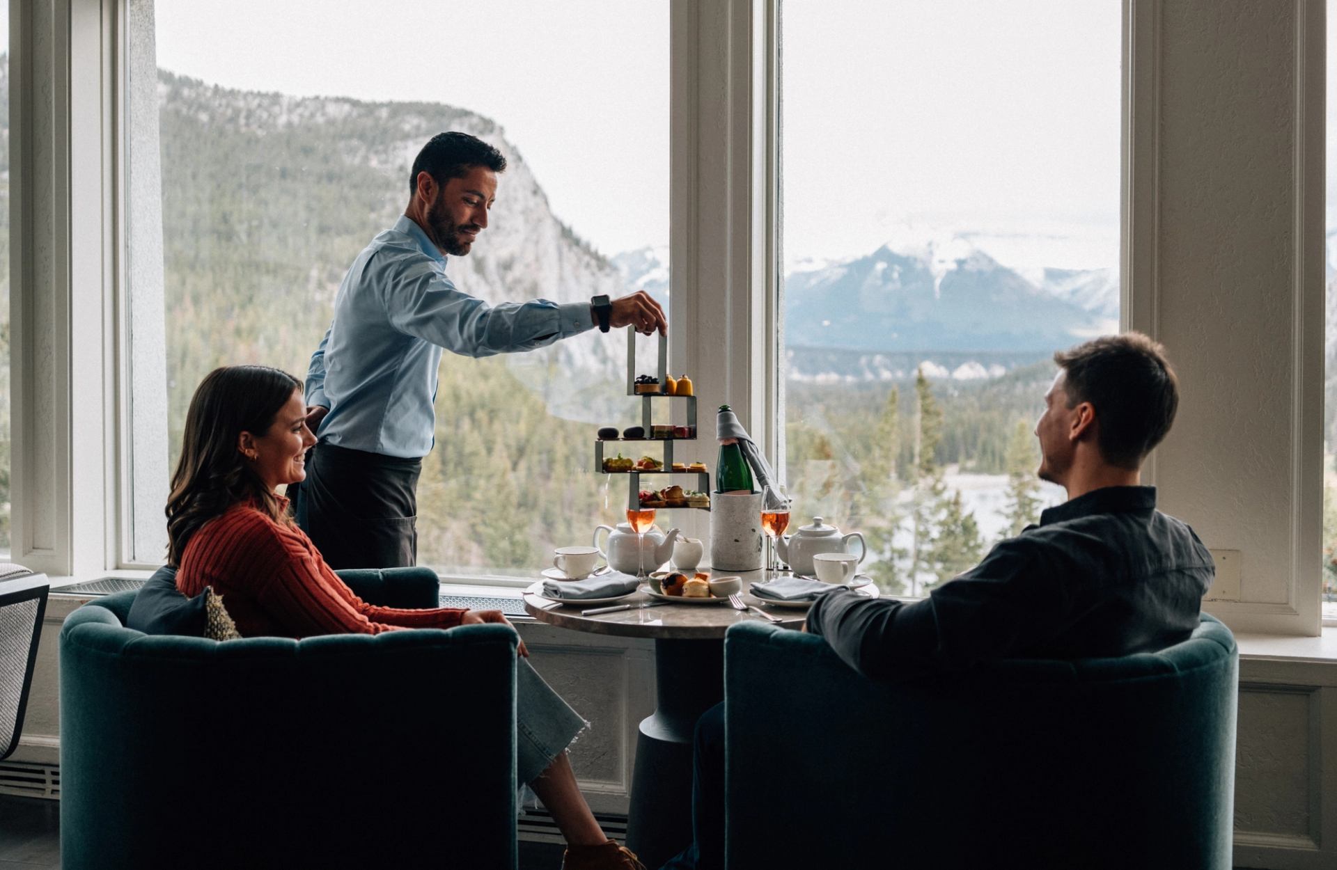 Afternoon tea served with mountain views at Fairmont Banff Springs.