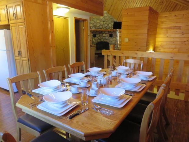 A dining table within one of Becker's Chalets.