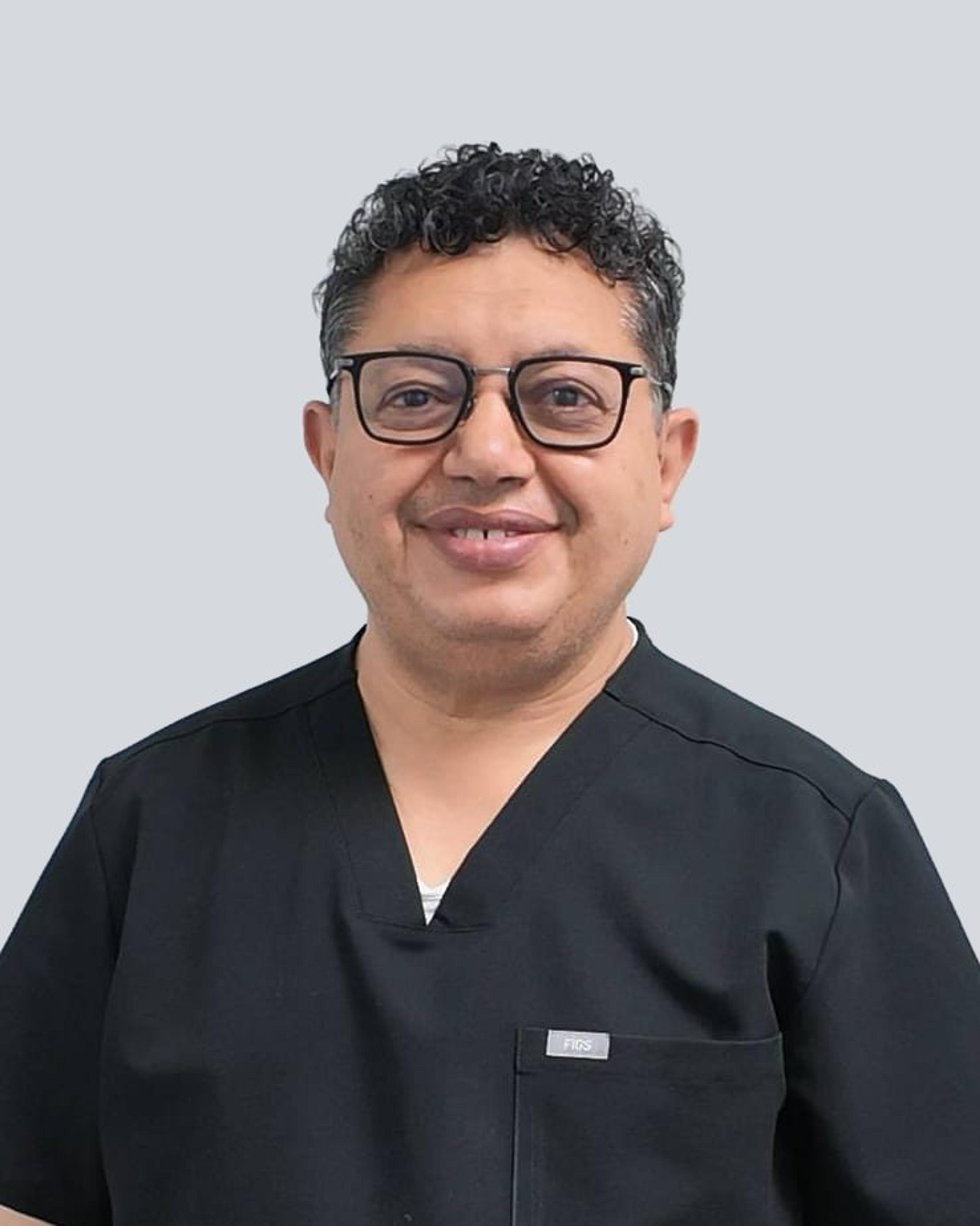 Dr. Mustafa Abouzgia, Oral & Maxillofacial Surgeon at Lord Dufferin Dental Centre
