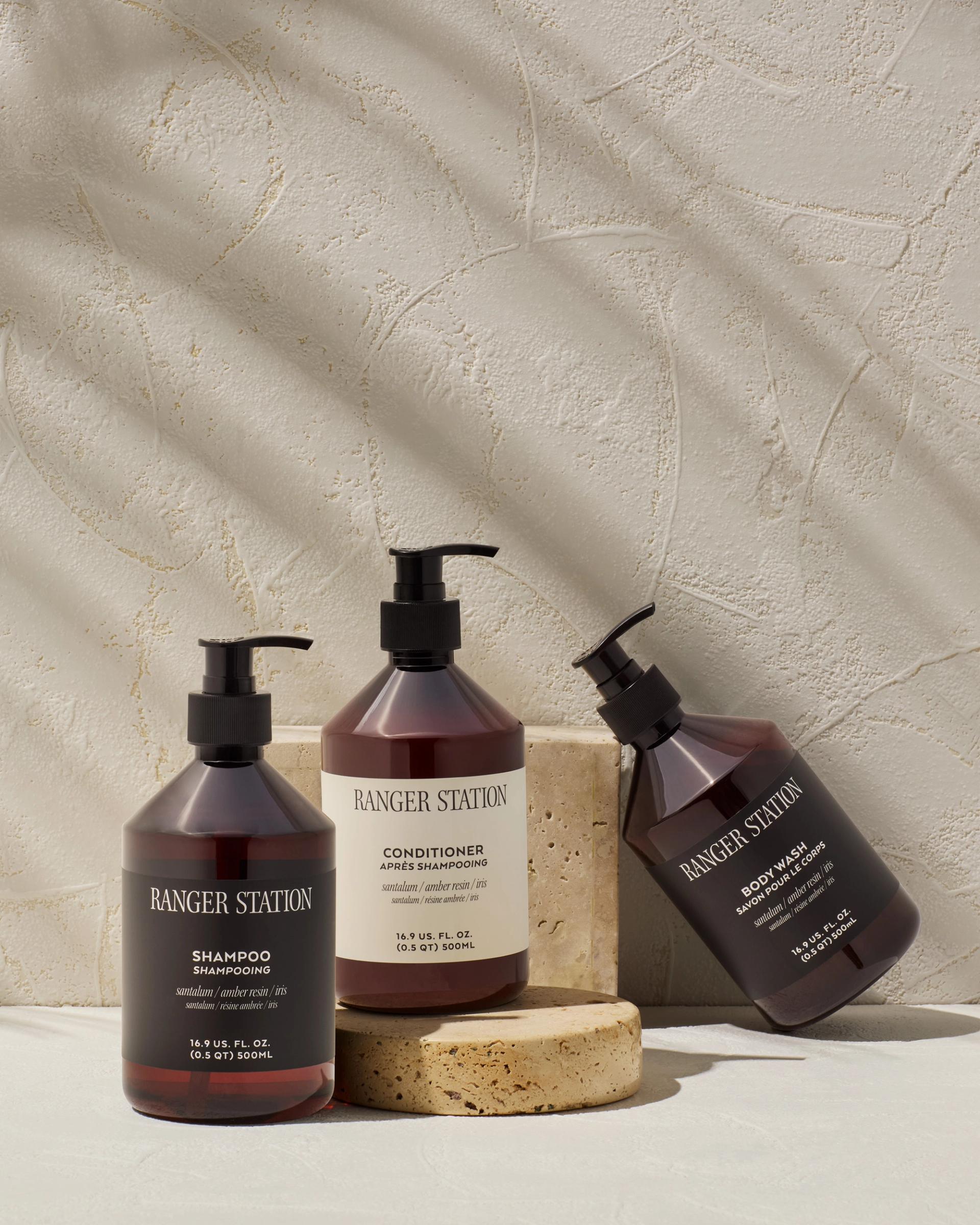 Ranger Station Santalum Shampoo, Conditioner, and Body Wash dispensers