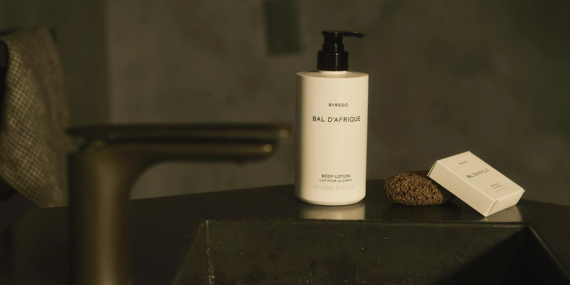 Byredo Bal d'Afrique Body Lotion and Boxed Bar of Soap on bathroom counter top