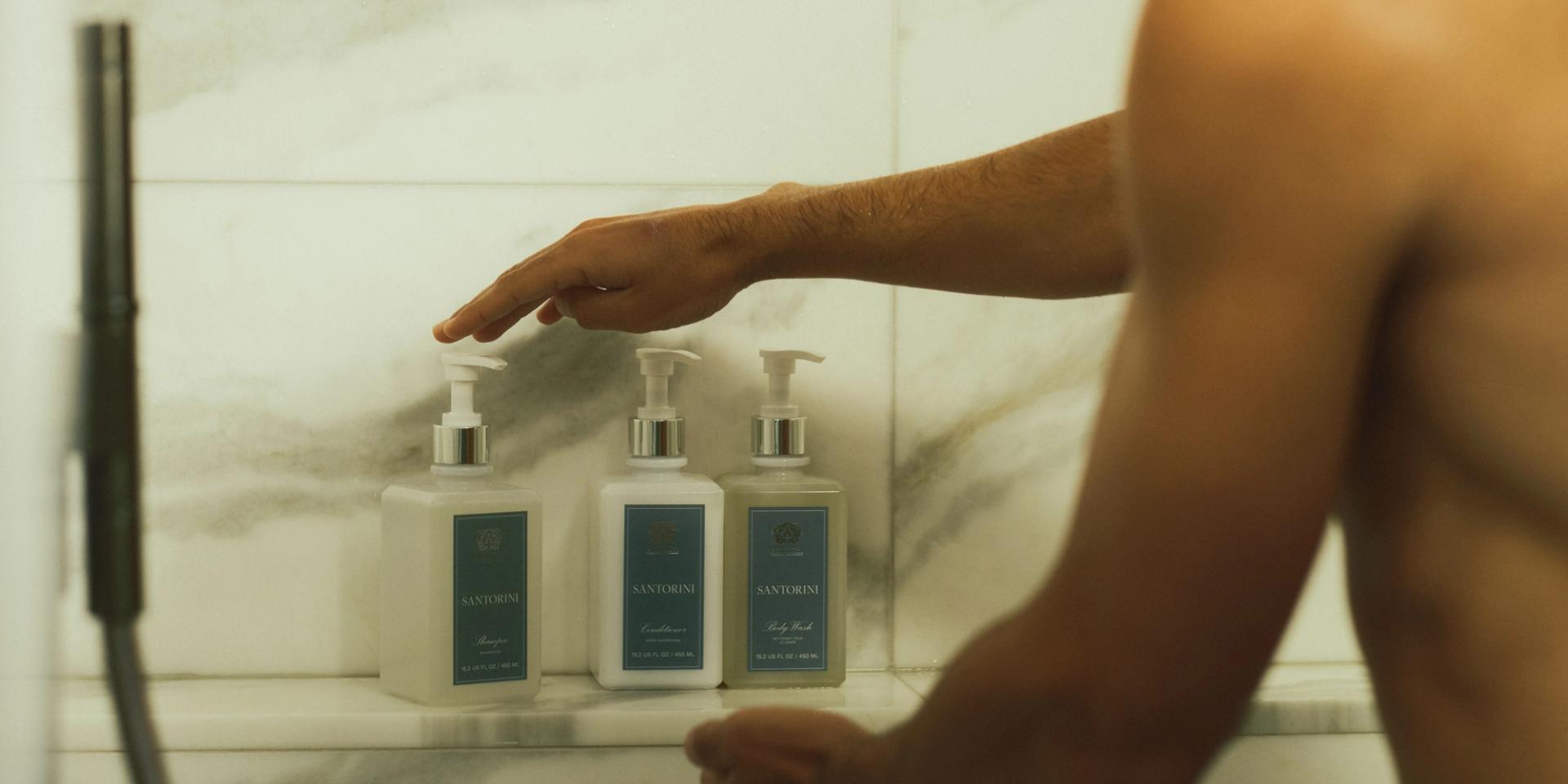 Antica Farmacista Shampoo, Conditioner and Body Wash in the shower with guy