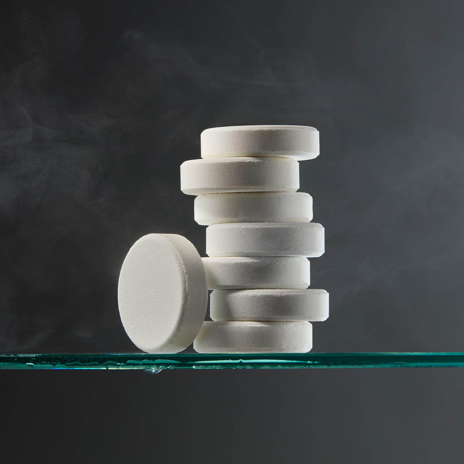 Crabtree & Evelyn Shower Steamer pucks stacked on shelf