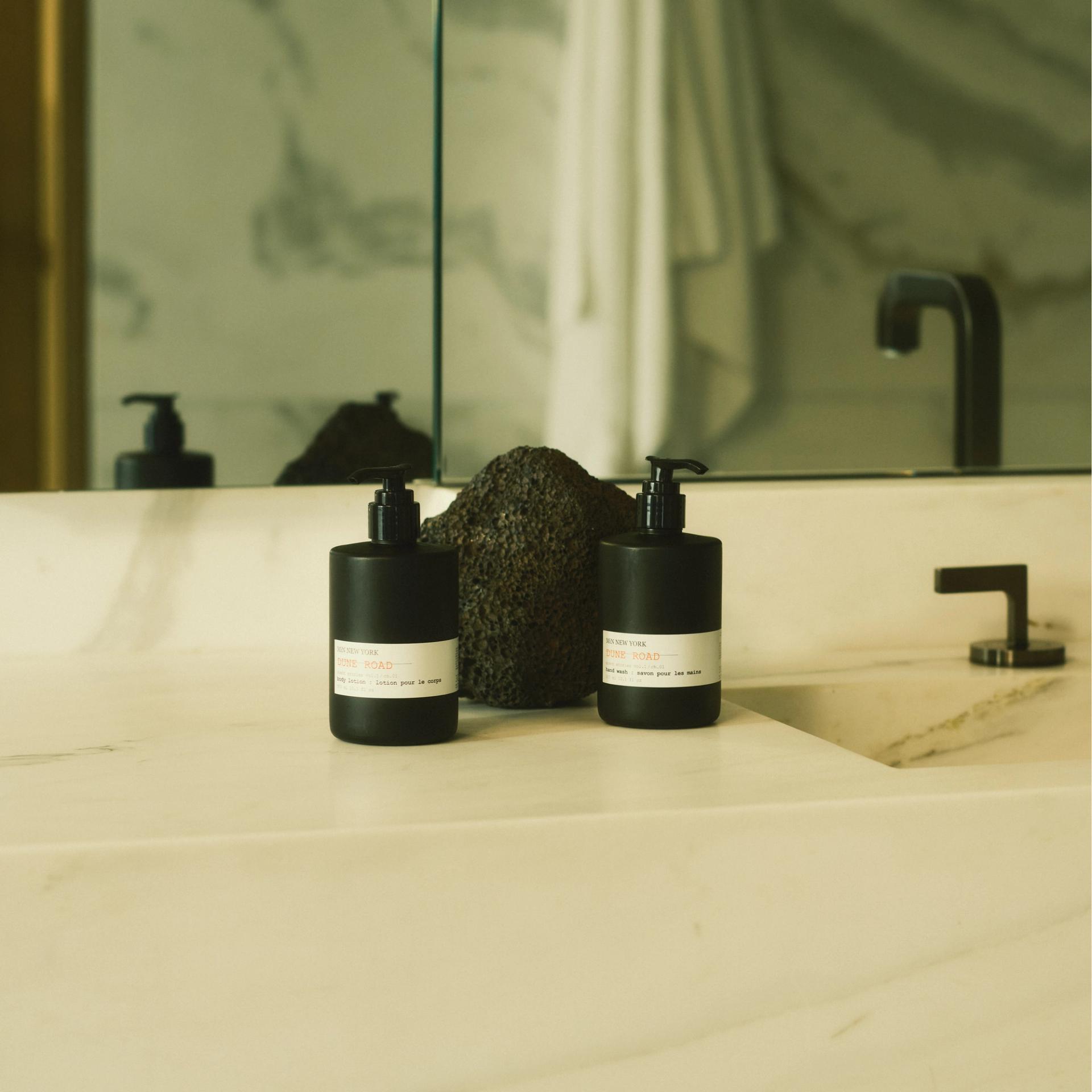 MiN New York Dune Road Body Lotion and Hand Wash dispensers on bathroom vanity