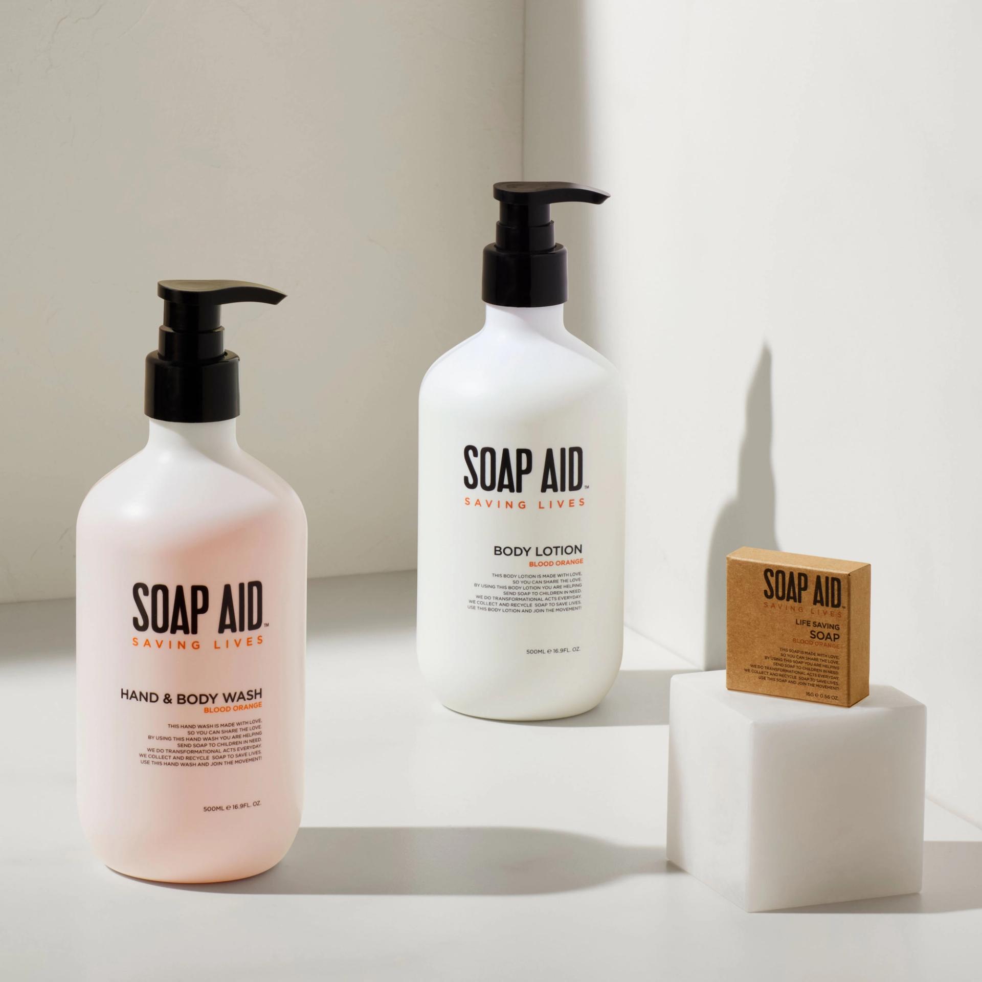 Soap Aid Hand & Body Wash, Body Lotion and a boxed bar of soap
