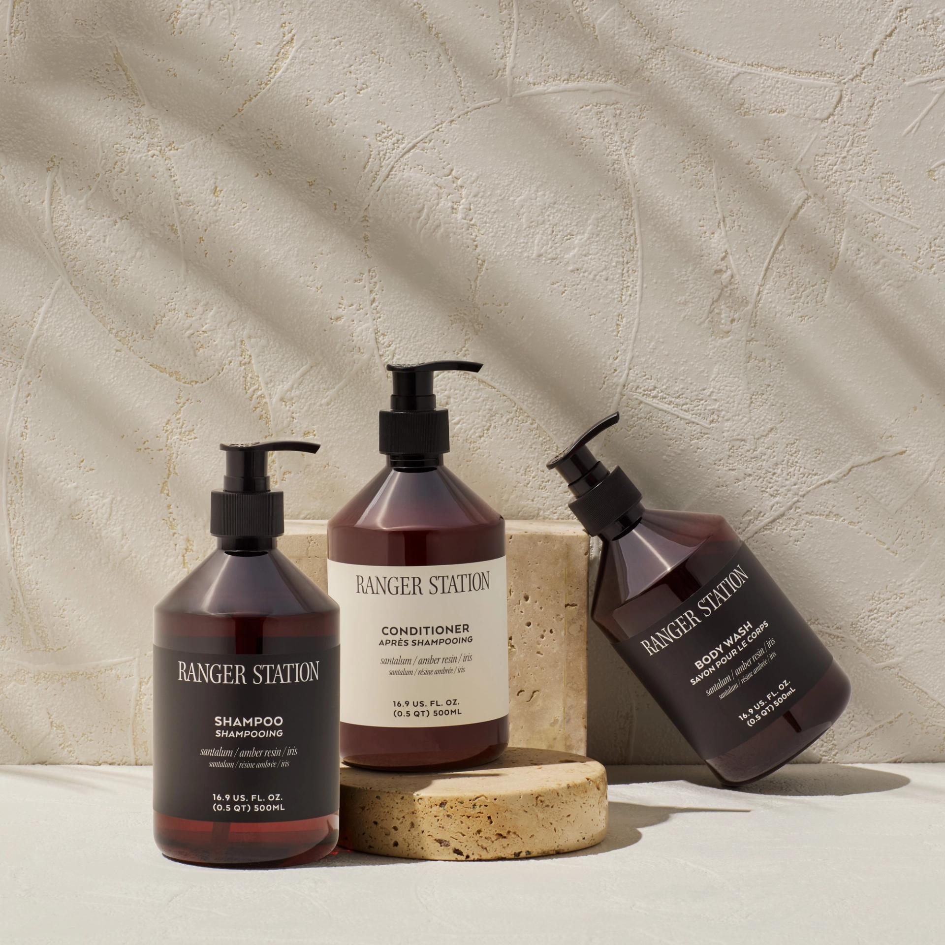 Ranger Station Santalum Shampoo, Conditioner, and Body Wash dispensers