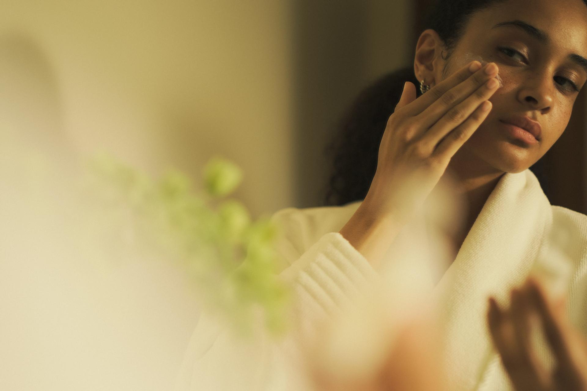 Girl Applying Face Cream