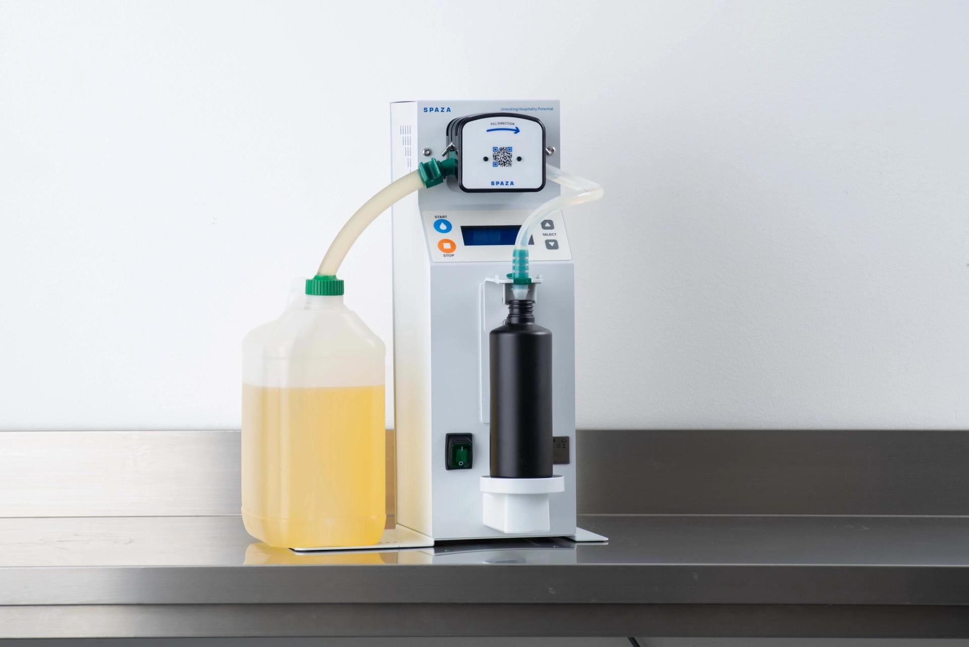 Spaza Refill Machine on counter filling a shampoo bottle