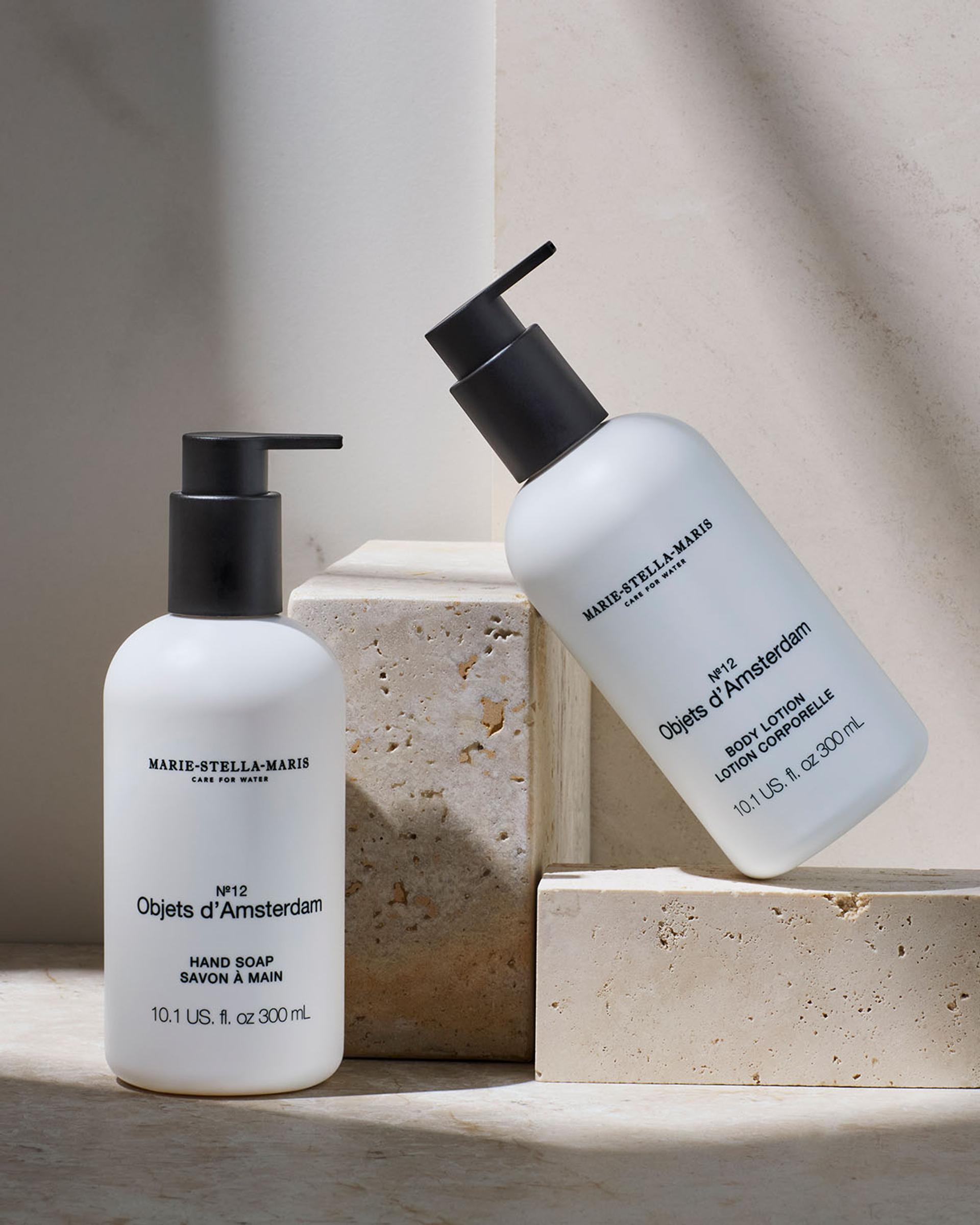 Marie Stella Maris Objets d'Amsterdam Hand Soap and Body Lotion dispensers on counter