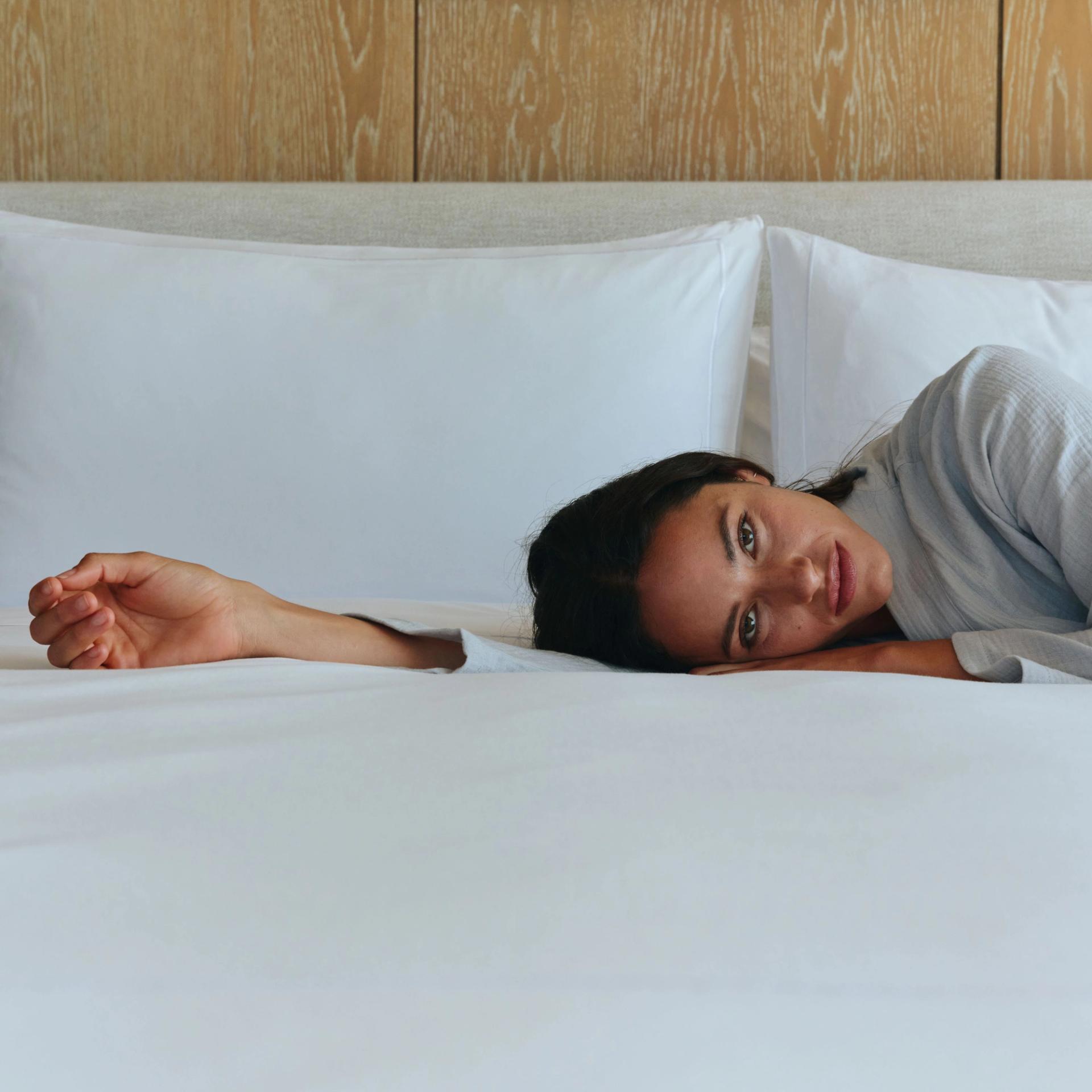 Model on a bed.