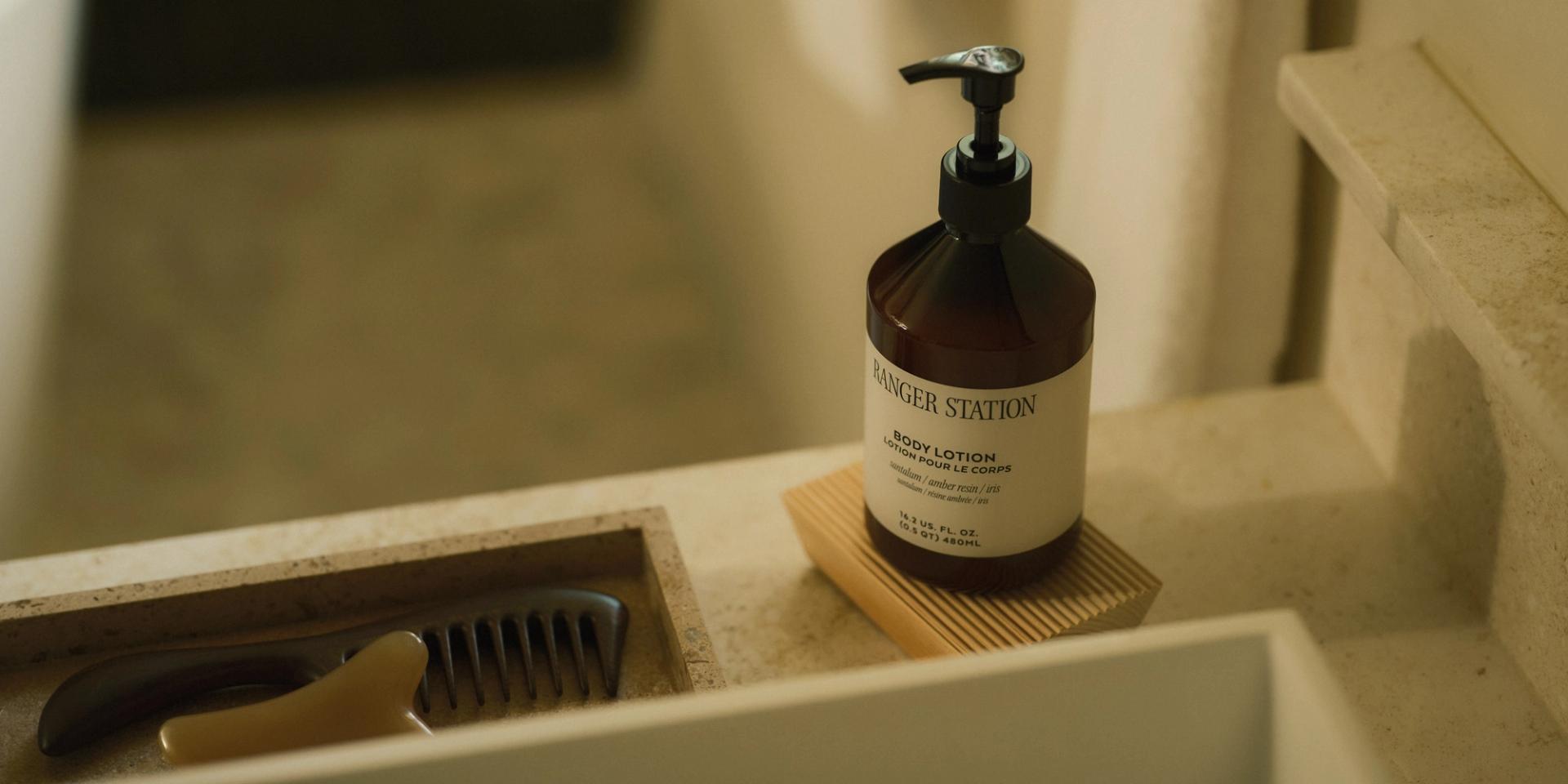 Ranger Station Santalum Body Lotion on bathroom vanity counter