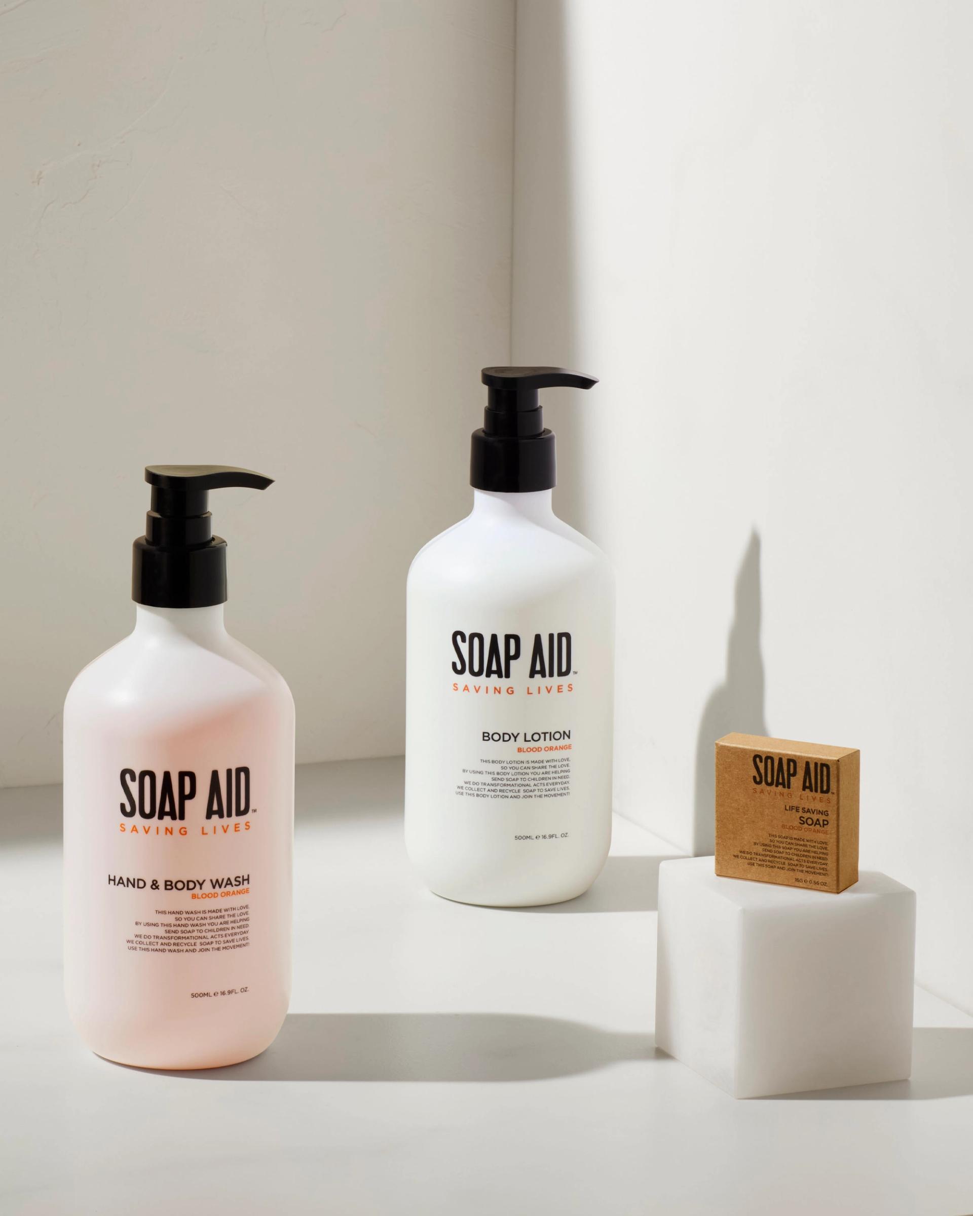 Soap Aid Hand & Body Wash, Body Lotion and a boxed bar of soap